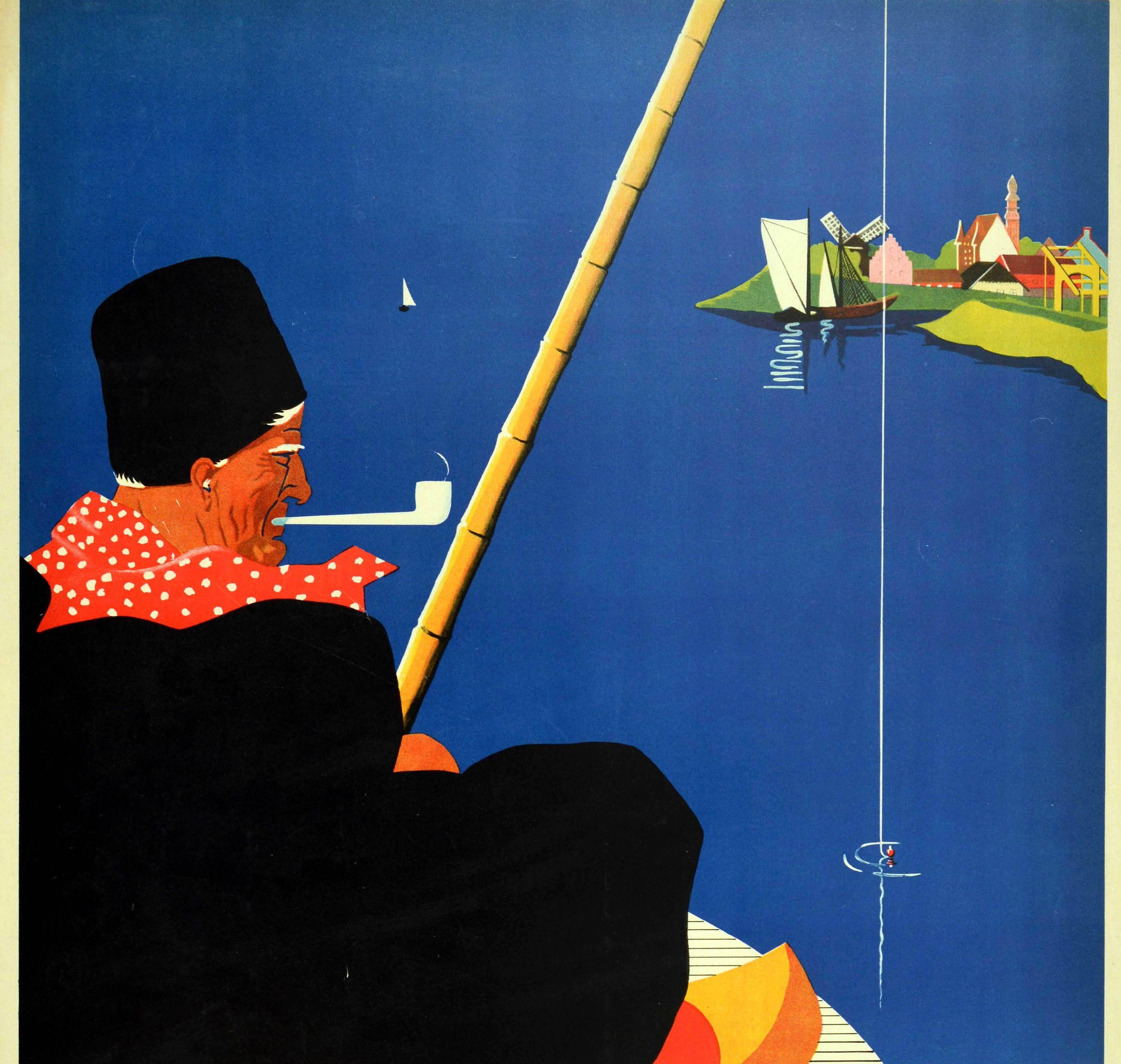 Original vintage travel poster for Holland featuring a great illustration of an elderly man wearing a black hat and red and white polka dot scarf smoking a pipe and fishing on calm blue water with sailing boats and a windmill next to houses in the