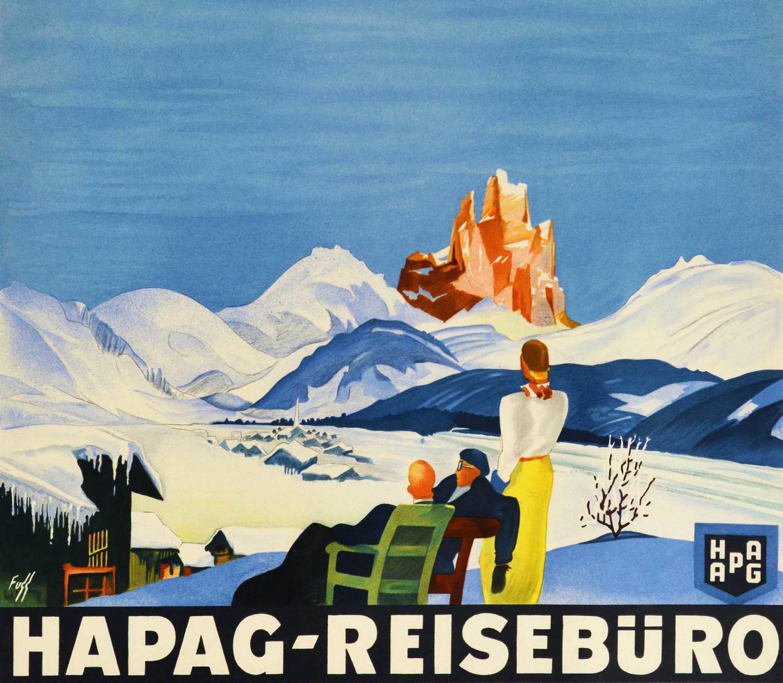 Original vintage travel poster for Hapag Reiseburo travel agency featuring a stunning Art Deco design by Albert Fuss (1889-1969) showing people relaxing on chairs and enjoying the winter view over snow topped roofs and fields towards the hills and a