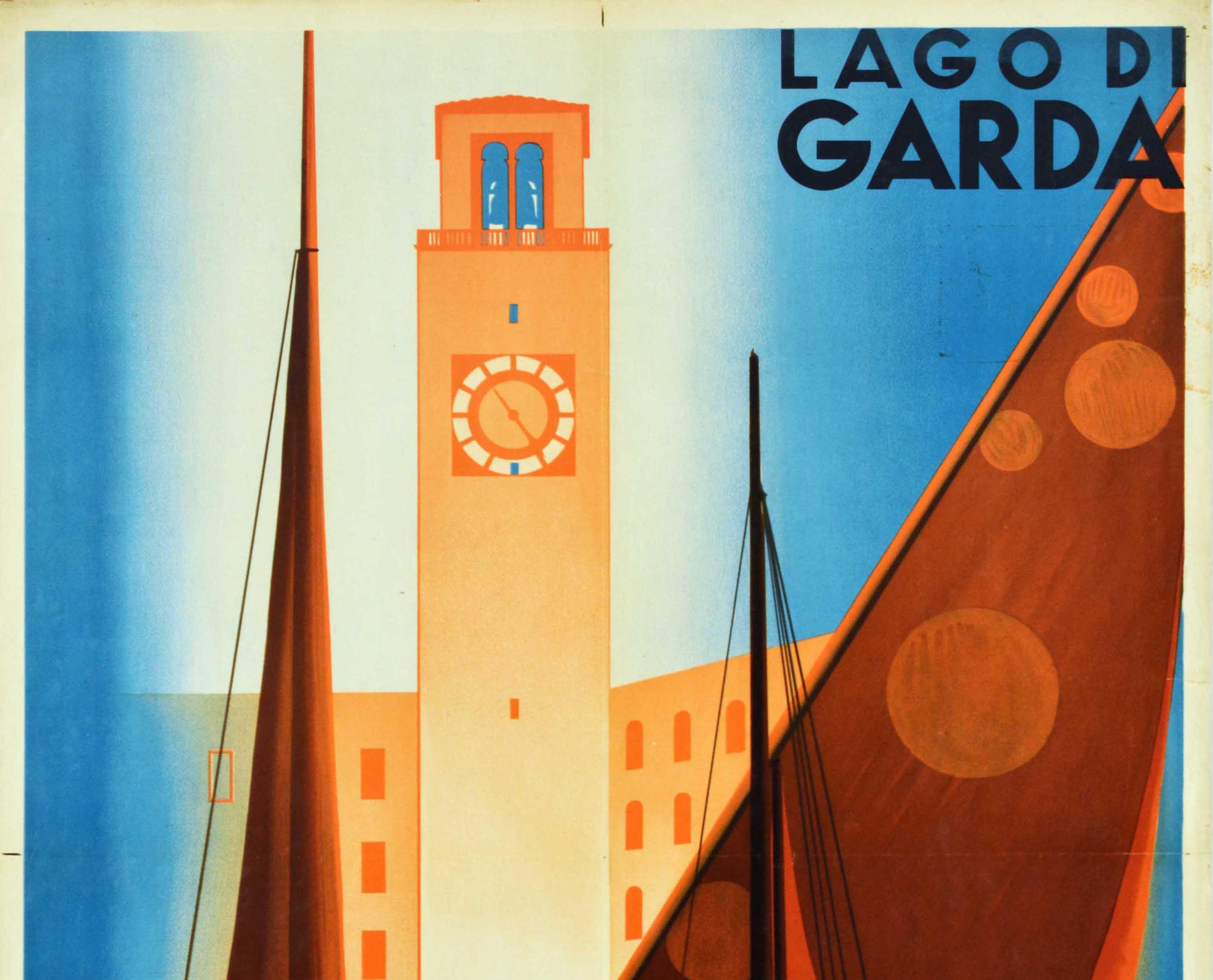 Original vintage ENIT travel poster for Lake Garda / Lago Di Garda Riva Torbole in Trentino Italy featuring a stunning Art Deco design by the Italian artist Giuseppe Riccobaldi (1887-1976) showing the sails of boats on the harbour in front of an