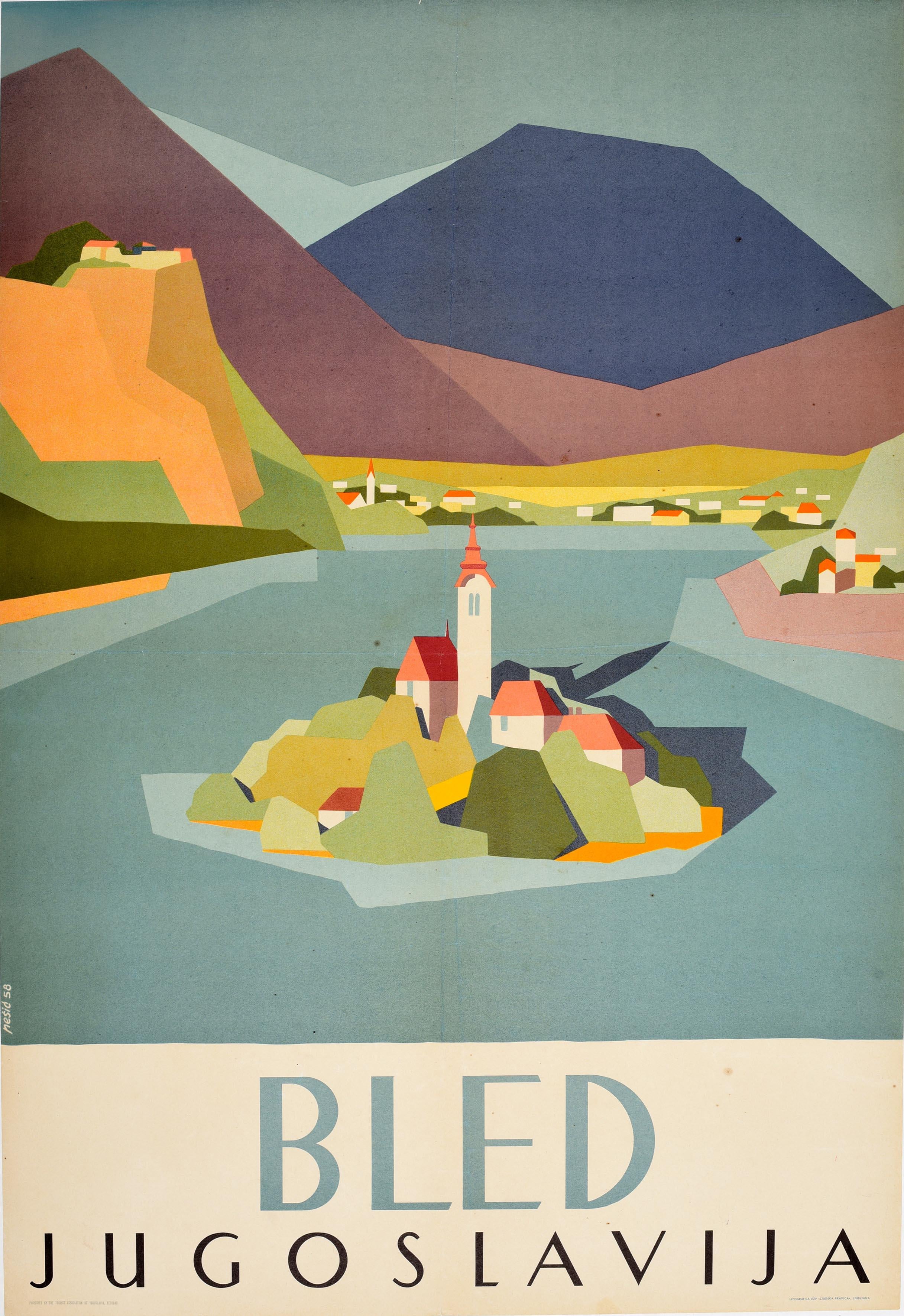Original vintage mid-century design travel poster for Bled Jugoslavija / Yugoslavia (now Slovenia) featuring a colourful scenic view of Lake Bled with the church tower over the buildings and trees on Bled Island surrounded by calm blue water with