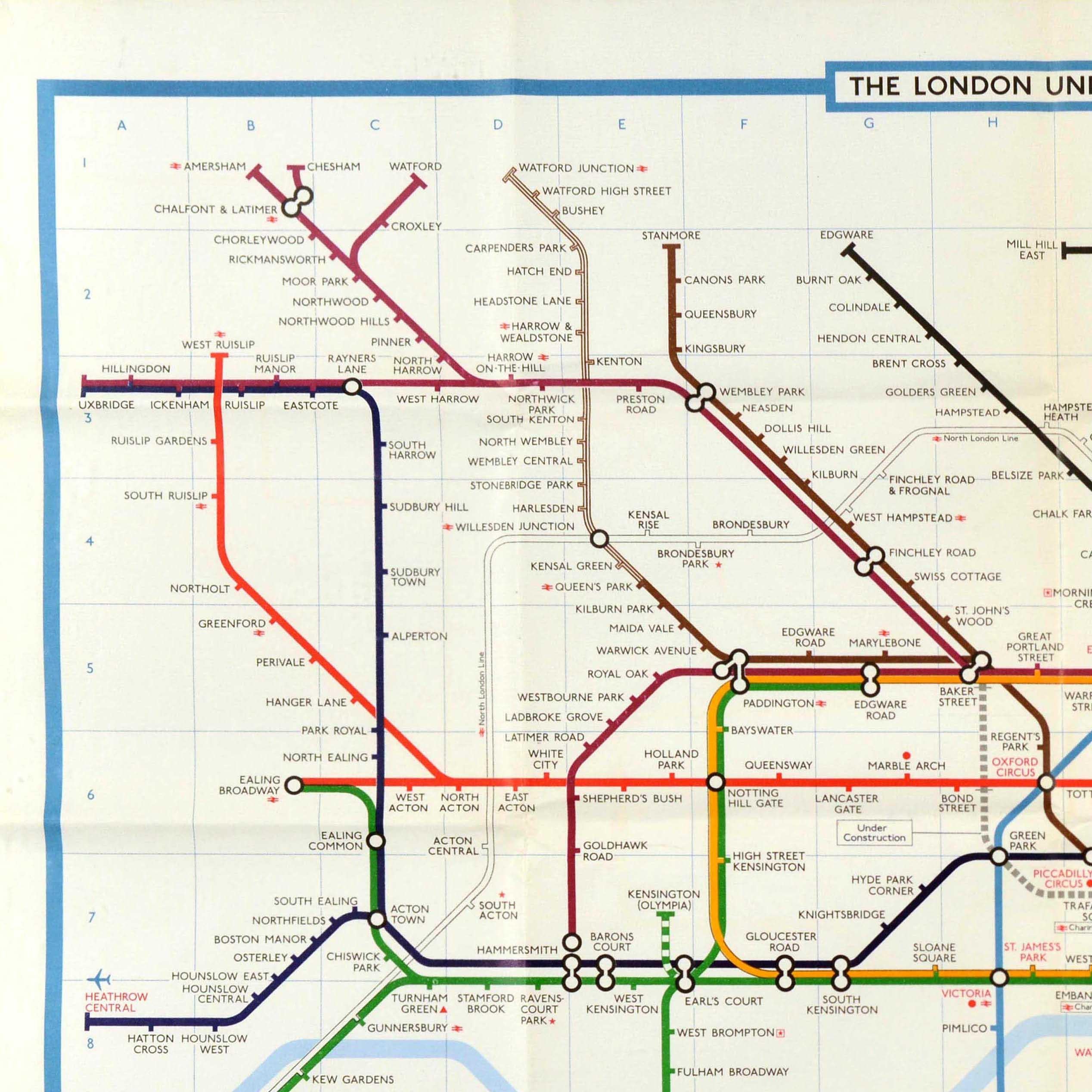 Original vintage tube map poster of The London Underground showing the Central Circle Piccadilly Victoria Northern District Metropolitan and Bakerloo lines, the Jubilee line under construction and the British Rail line with Exhibition Service only