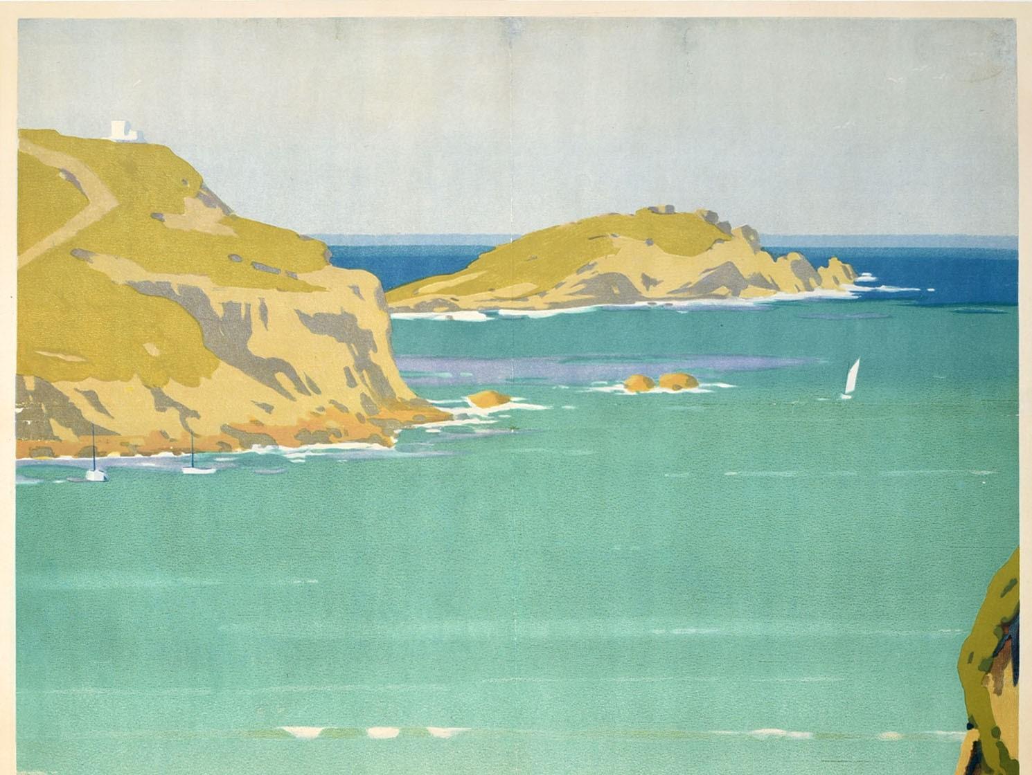 Original vintage train travel poster for Newquay On The Cornish Coast issued by GWR Great Western Railway featuring a scenic view of people enjoy their holiday on the sandy beach and swimming in the waves with a sailing boat at sea and surfers