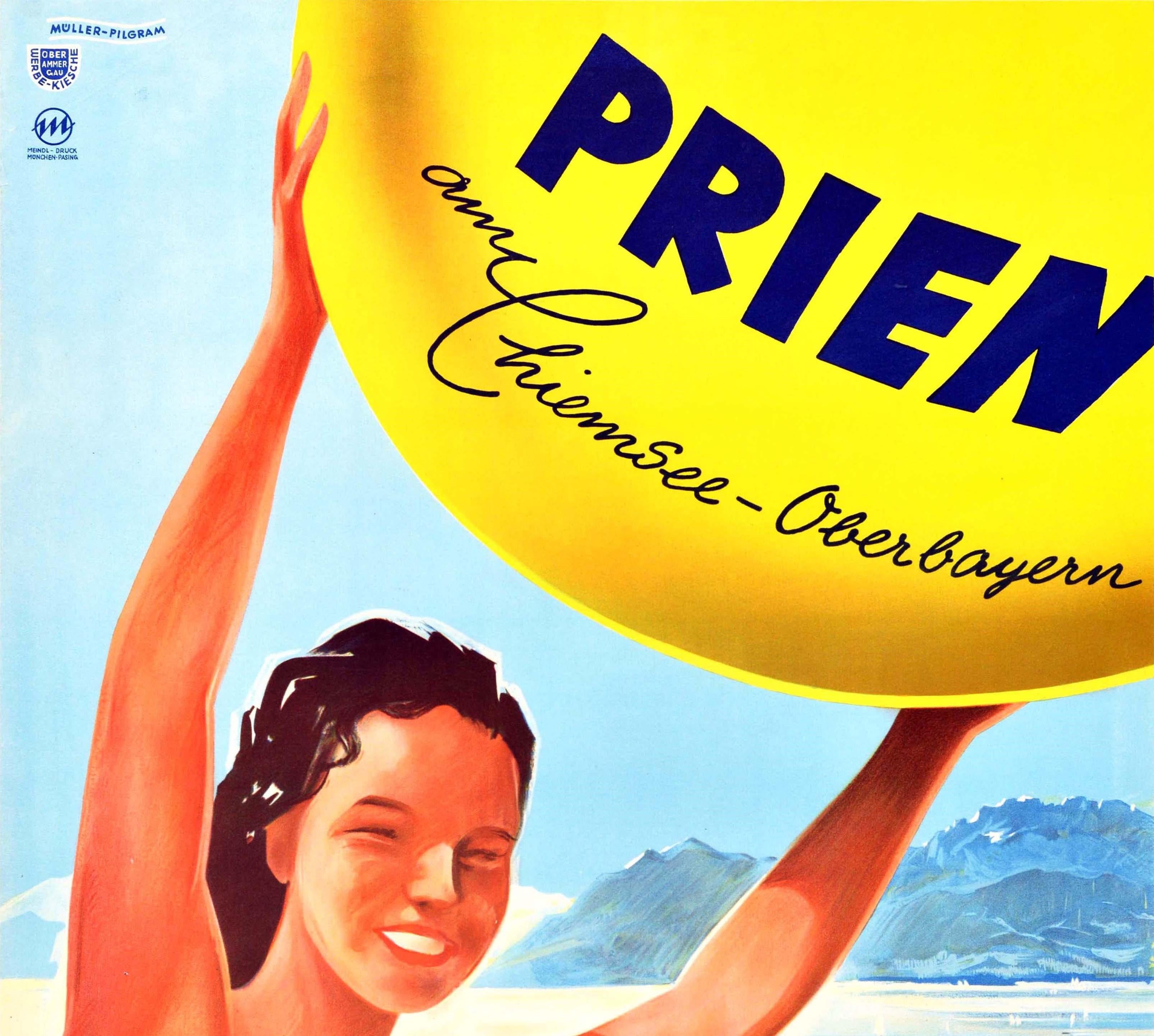 Original vintage travel poster for Prien am Chiemsee Oberbayern Bavaria Germany featuring a smiling lady in a red swimming costume holding a large yellow beach ball above her head with a view over the town showing a church and houses next to a sandy