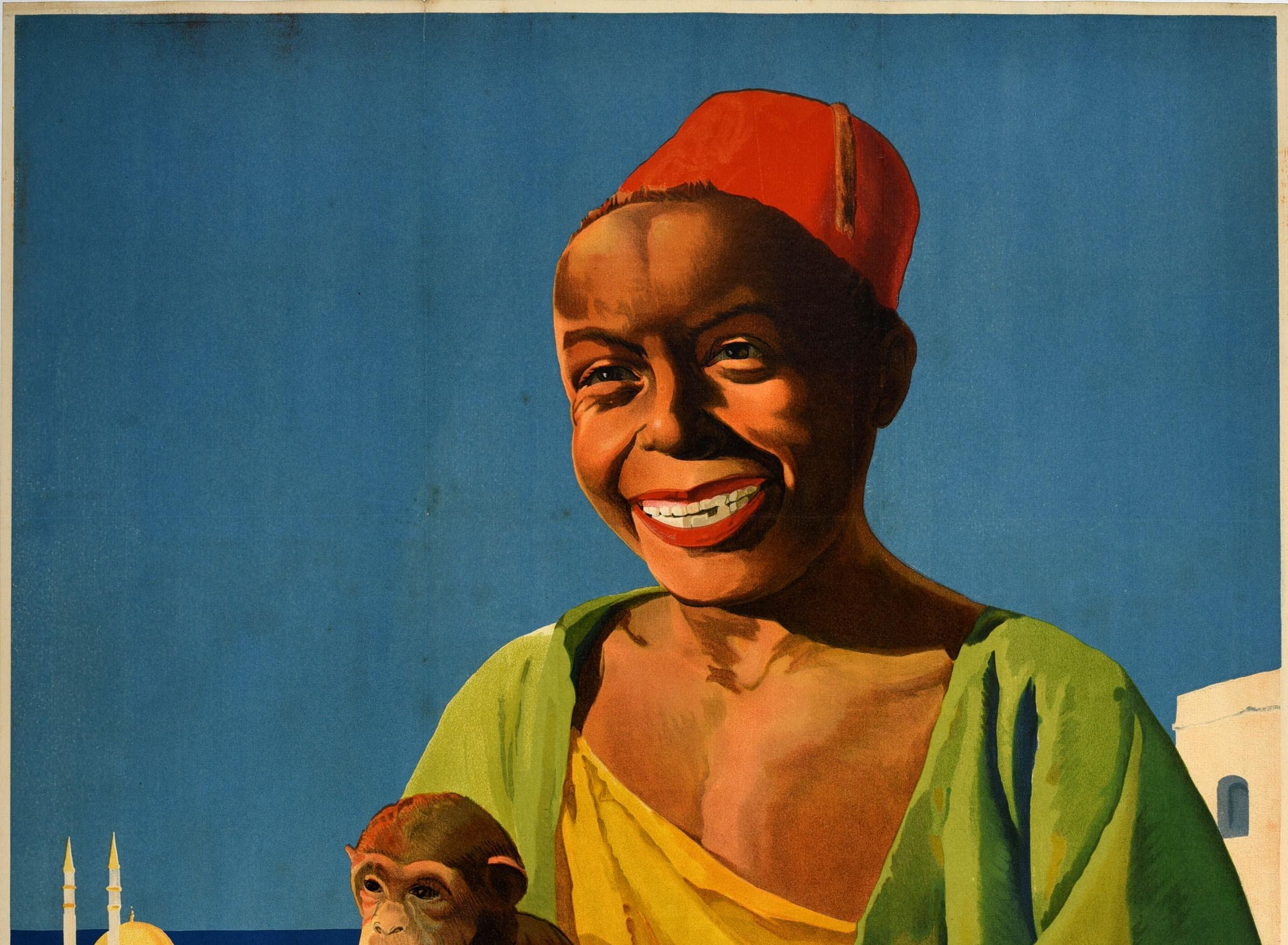 Original vintage travel poster for Royal Mail Line Atlantis Cruises featuring artwork by the British poster designer Percy Padden (1885-1965) depicting a smiling boy with a monkey in the foreground and a view over trees to the city and sea below the