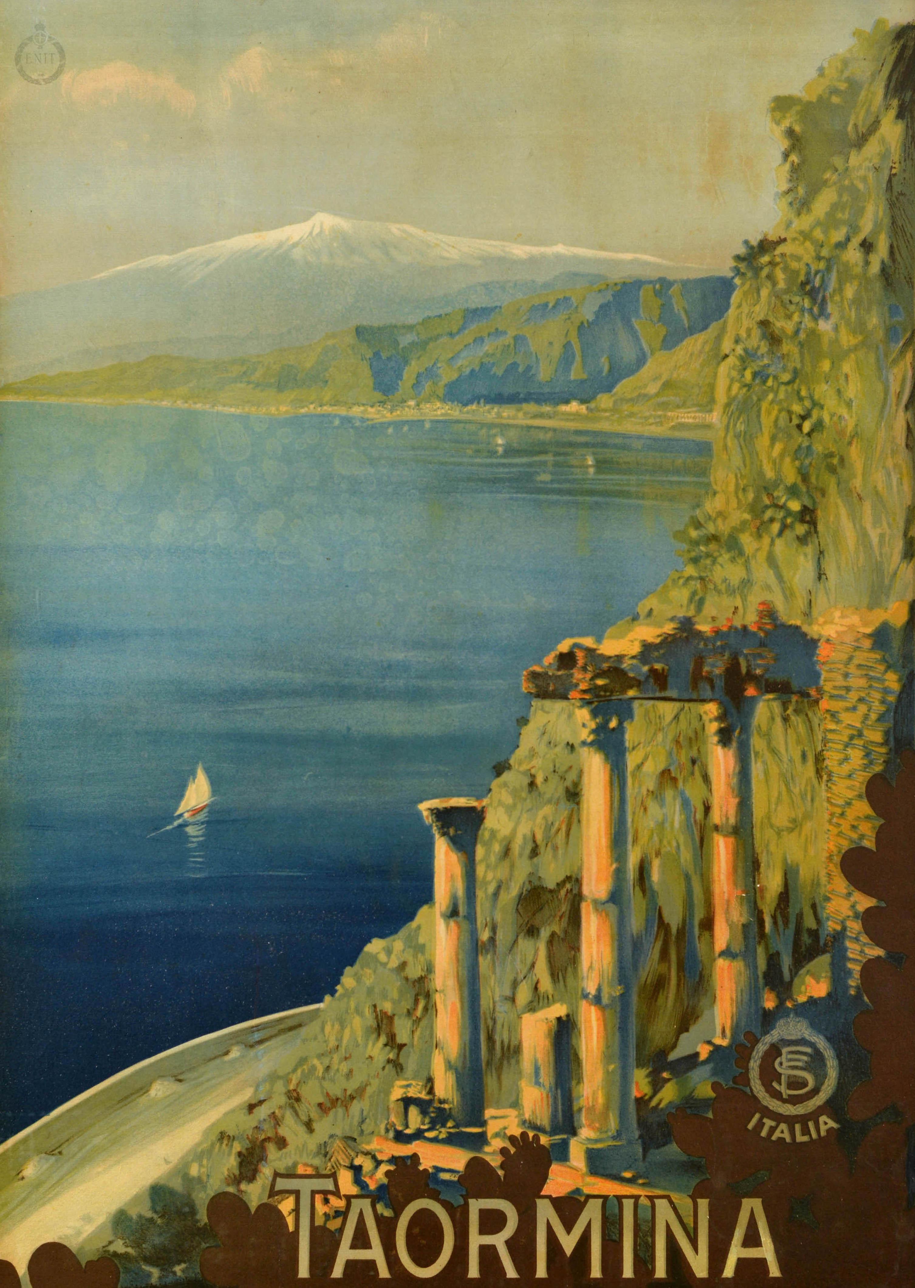 Original vintage travel poster Taormina Italia featuring stunning artwork of the hilltop town in Sicily with a view over the ancient ruins and sailing boats on the calm blue sea leading around the coast to a snow topped Mount Etna in the distance,