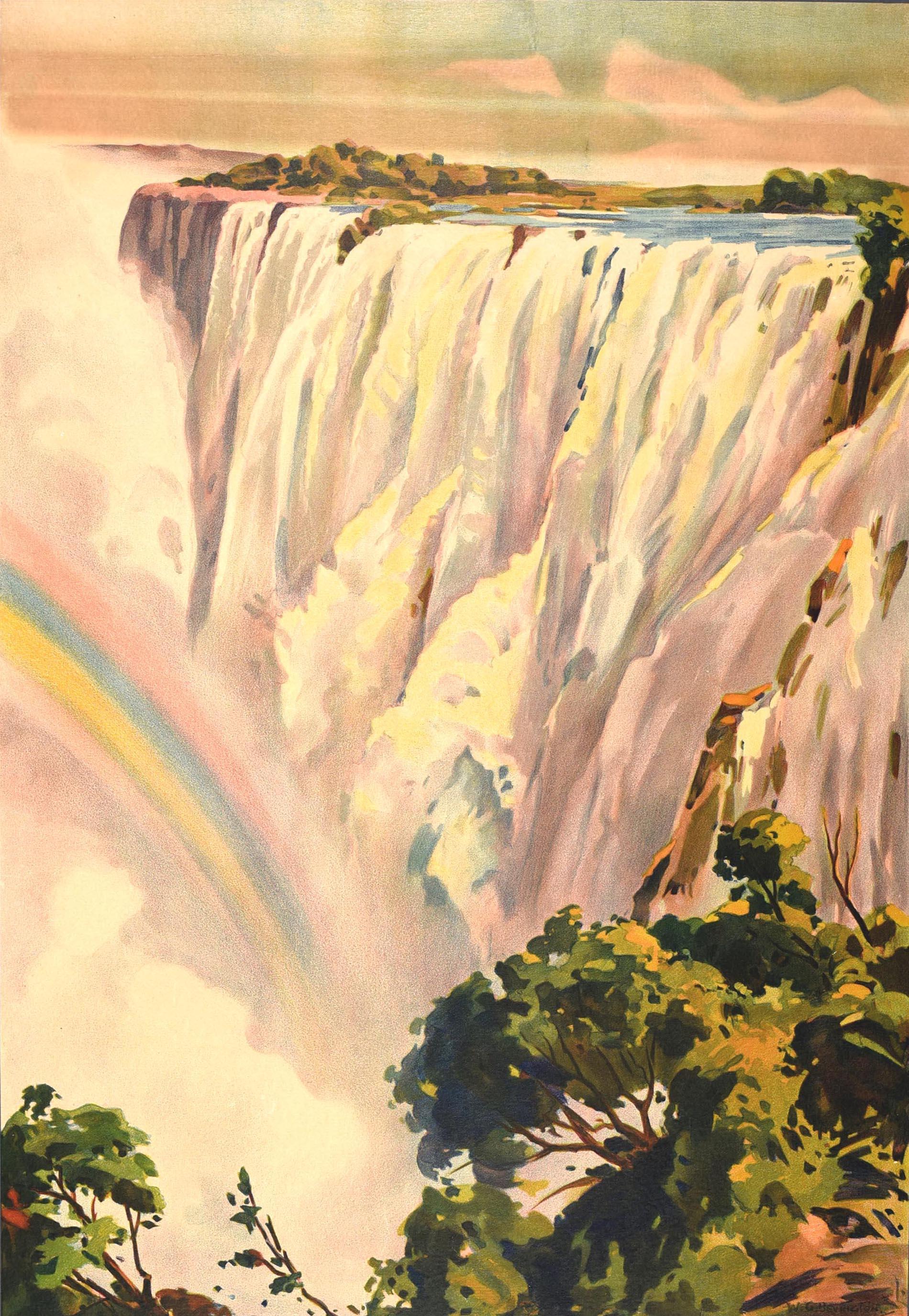 Original vintage travel poster - Victoria Falls more than a mile wide Southern Rhodesia - featuring scenic artwork by William George Bevington (1881-1953) depicting a rainbow emerging from the cascading water at the base of the Victoria Falls