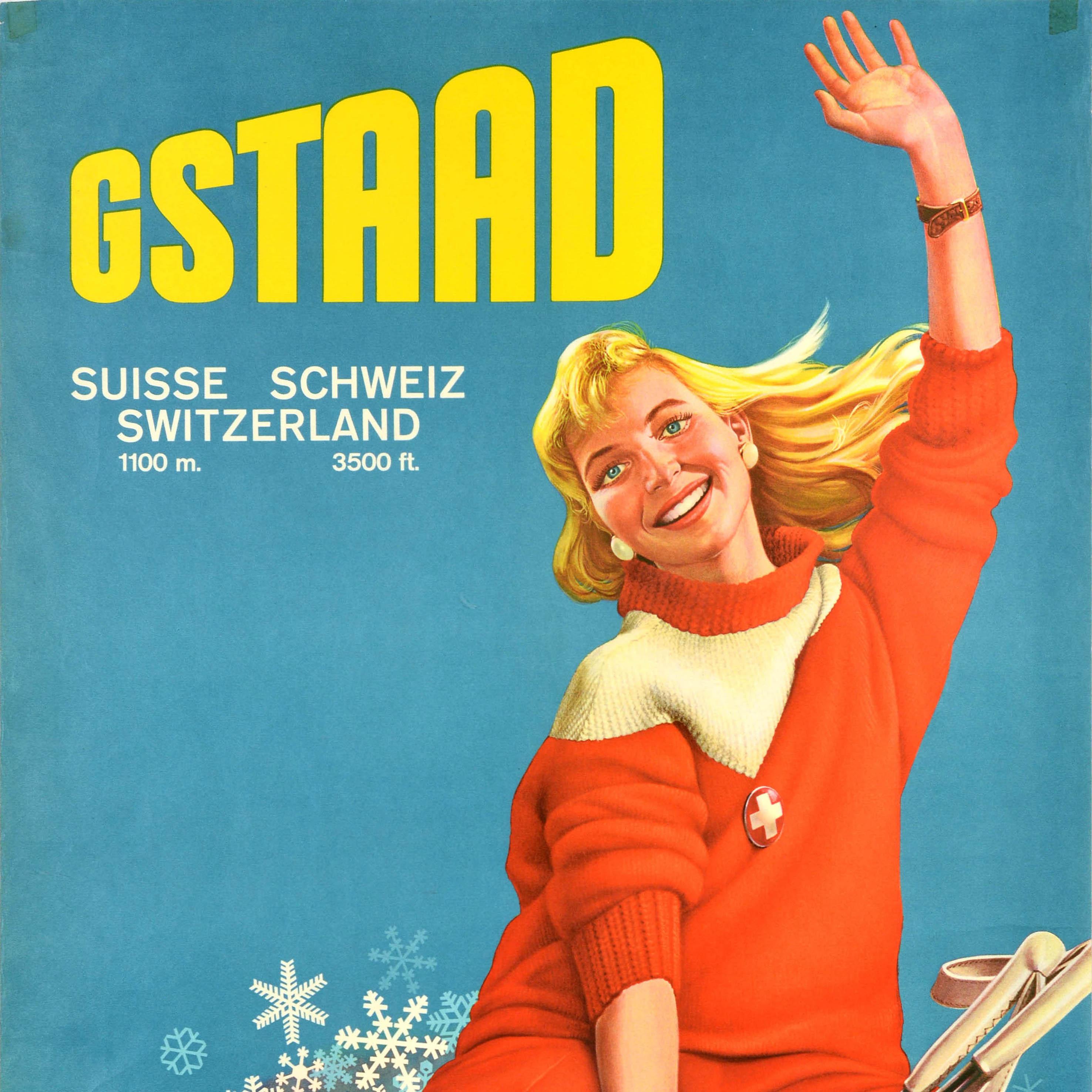 Original vintage travel and skiing poster for Gstaad Suisse Schweiz Switzerland 1100m 3500ft featuring an image of a smiling lady sitting on a cloud of snowflakes holding ski poles in one hand and waving to the viewer with her other hand, the Swiss