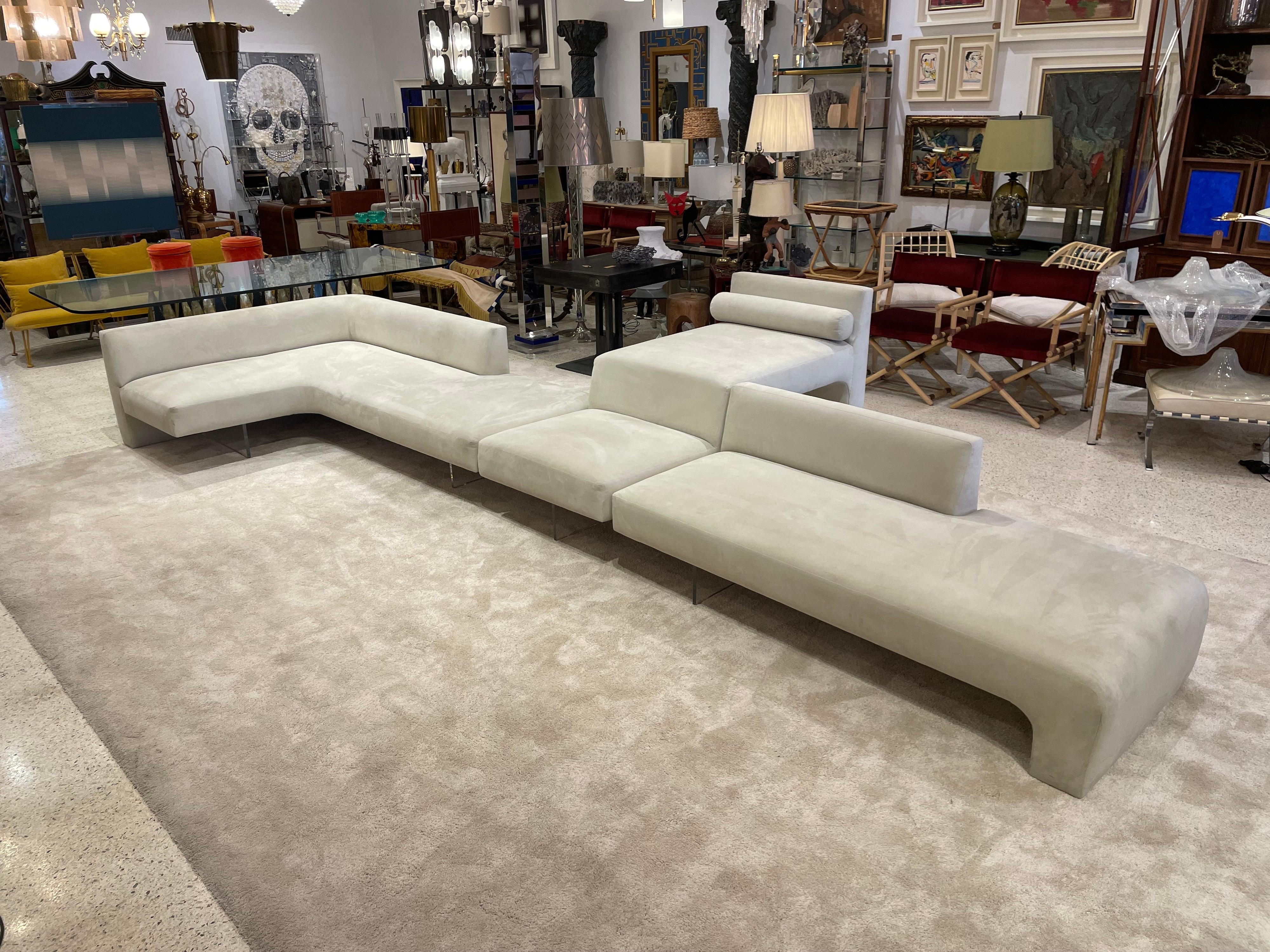 This Iconic Valdimir Kagan sectional sofa in 3 parts (corner, tiered chaise and long straight piece), is all original with Original Alcantara Ultrasuede fabric. 

Dimensions of corner section: 92 inches wide, 62 inches deep at its longest, 34