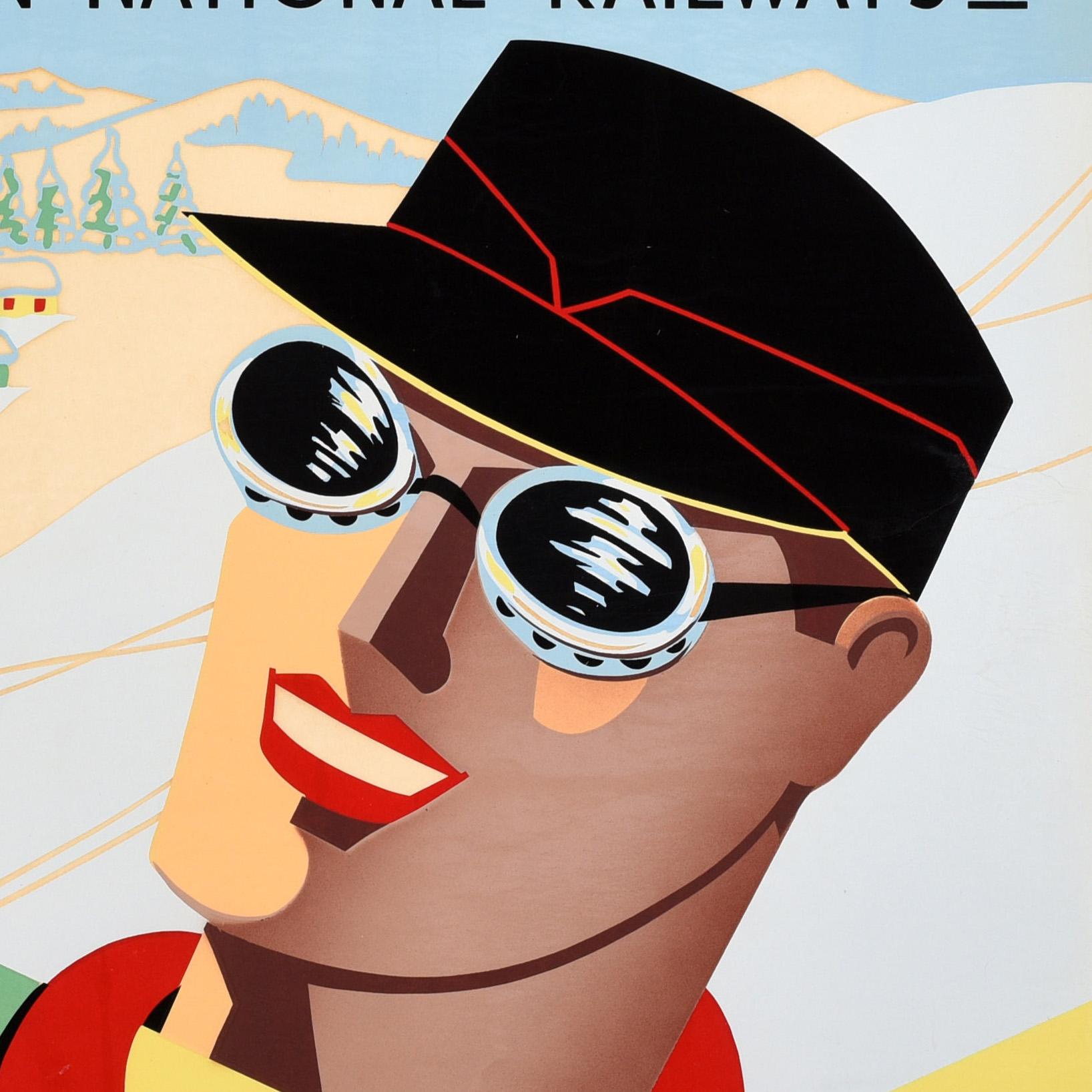 Affiche originale de voyage en train pour le ski et les sports d'hiver - Ski in Canada Canadian National Railways Powder snow Rolling hills Fast trails - représentant un skieur souriant portant des lunettes de ski, un bonnet et une veste à carreaux
