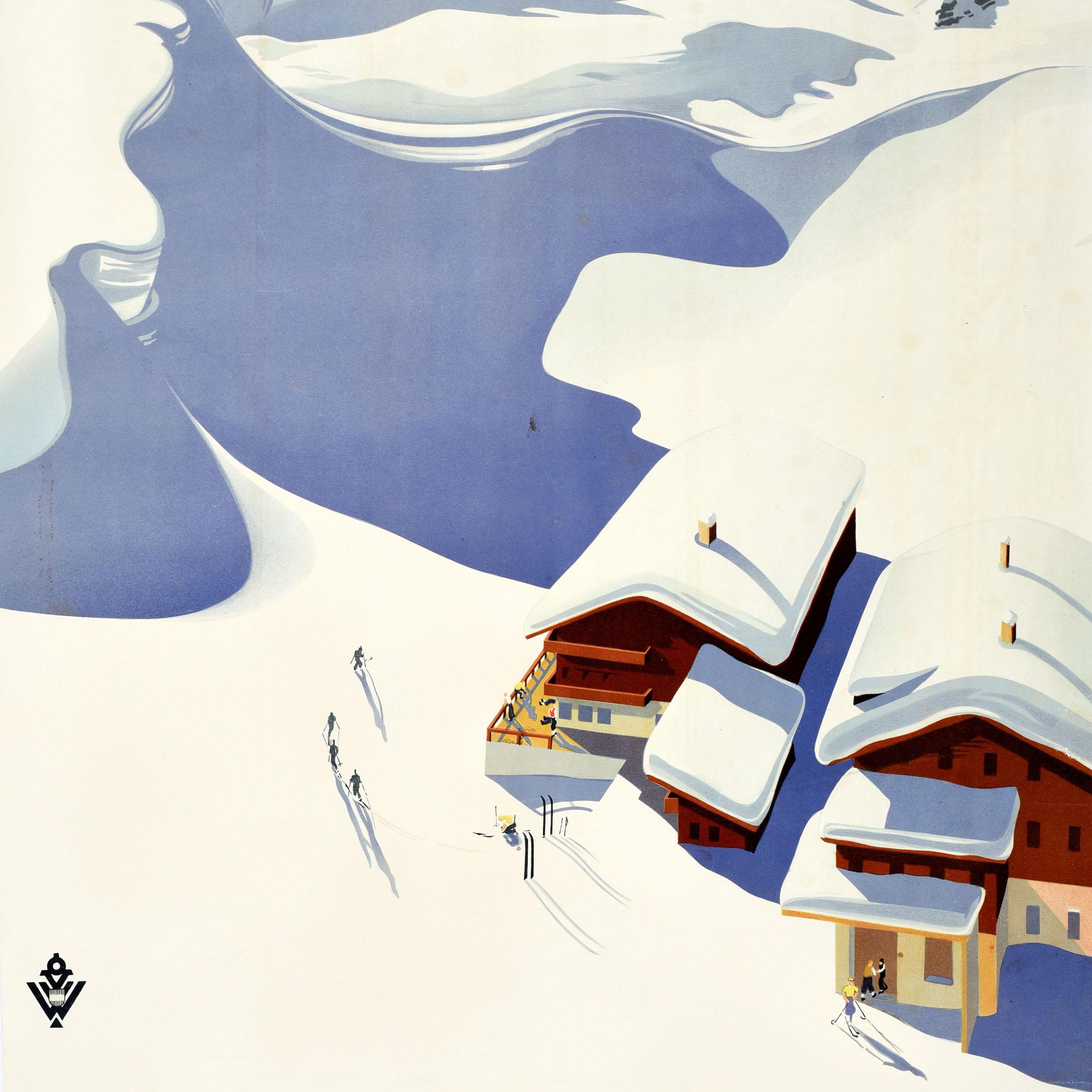 Original vintage winter sport and skiing travel poster for Austria featuring stunning artwork by Erich von Wunschheim depicting skiers on a snowy mountain next to snow topped chalets with people on the terrace and skis in the snow casting long