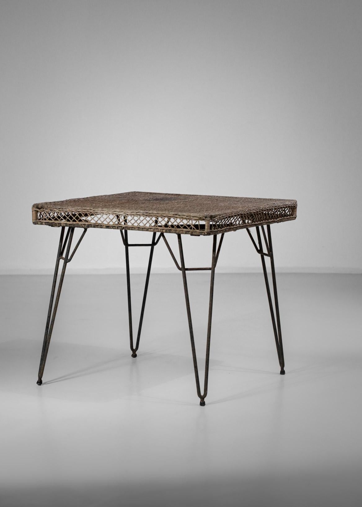 Square woven rattan table from the 1950s in the style of the work of French designer Mathieu Matégot. 