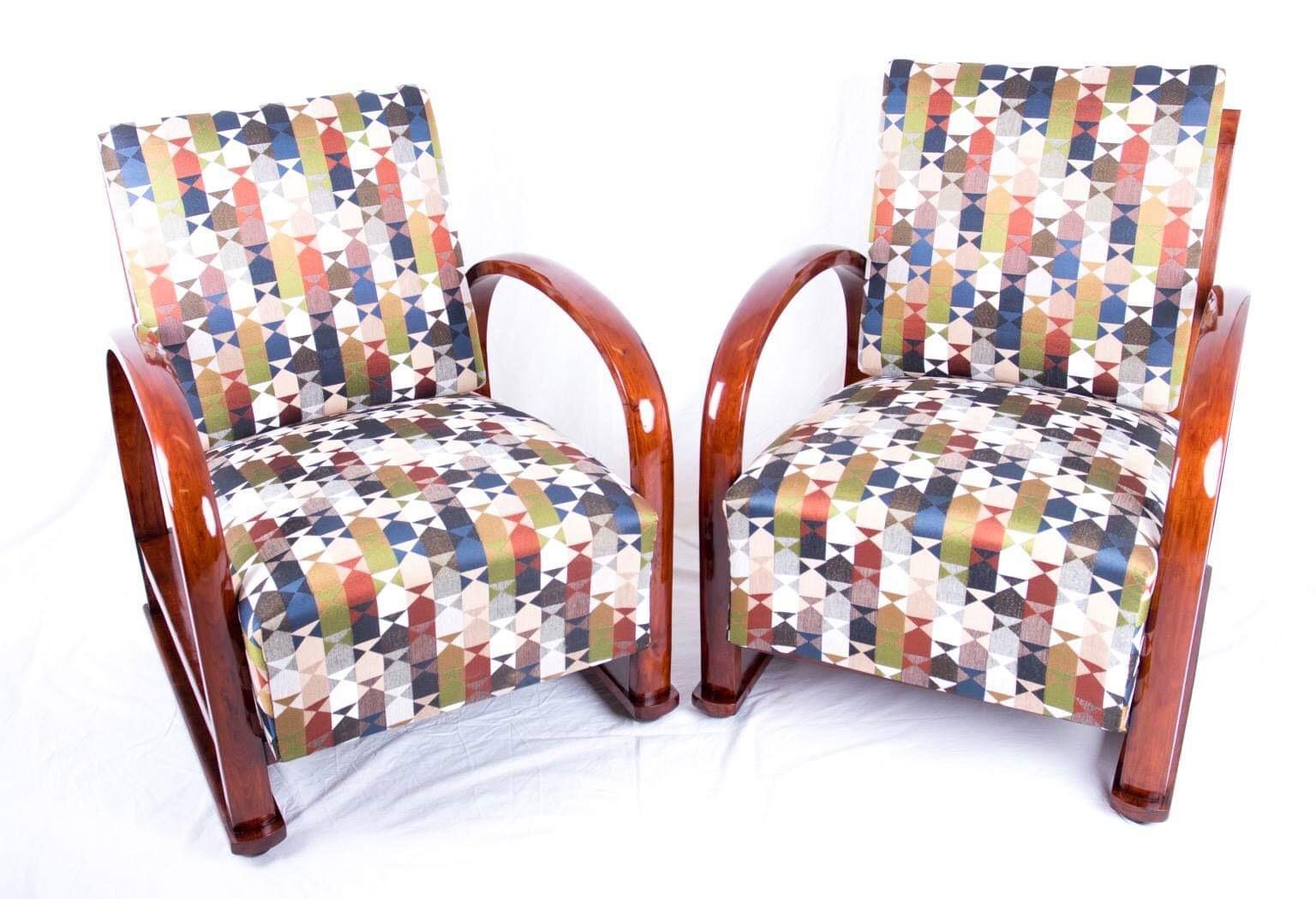 Viennese Art Deco armchairs are original and completely restored in high quality with new upholstery and fabric, and wood is selackpolitur. Original Art Deco fabric, the chair can be folded into three position.