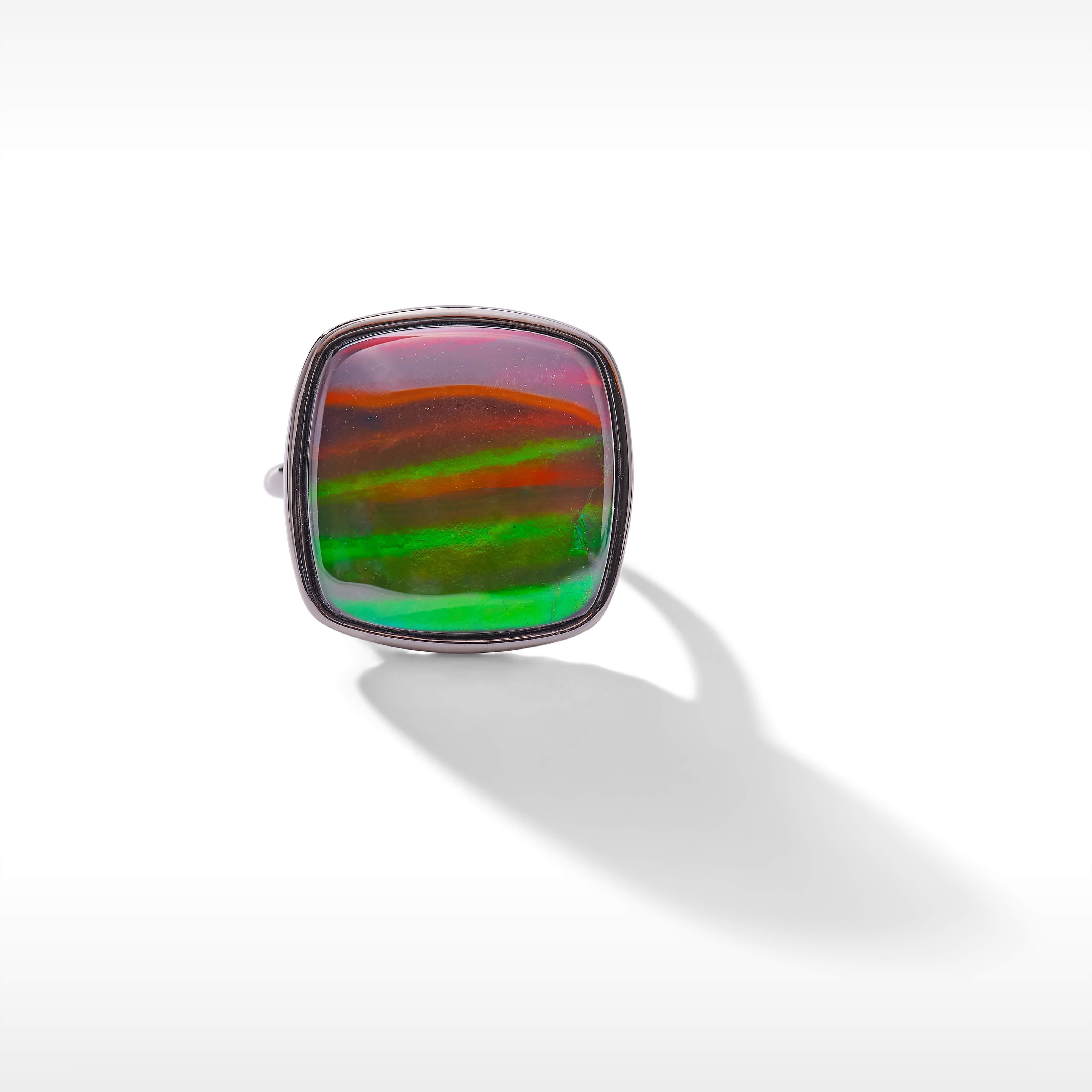 Product Details:

The Origins collection features bold ammolite showpieces highlighting organic textures inspired by our ammonite roots.

A grade Ammolite
18mm cushion Ammolite ring
925 Sterling Silver
Ring dimension: 20.16mm x 20.37mm.