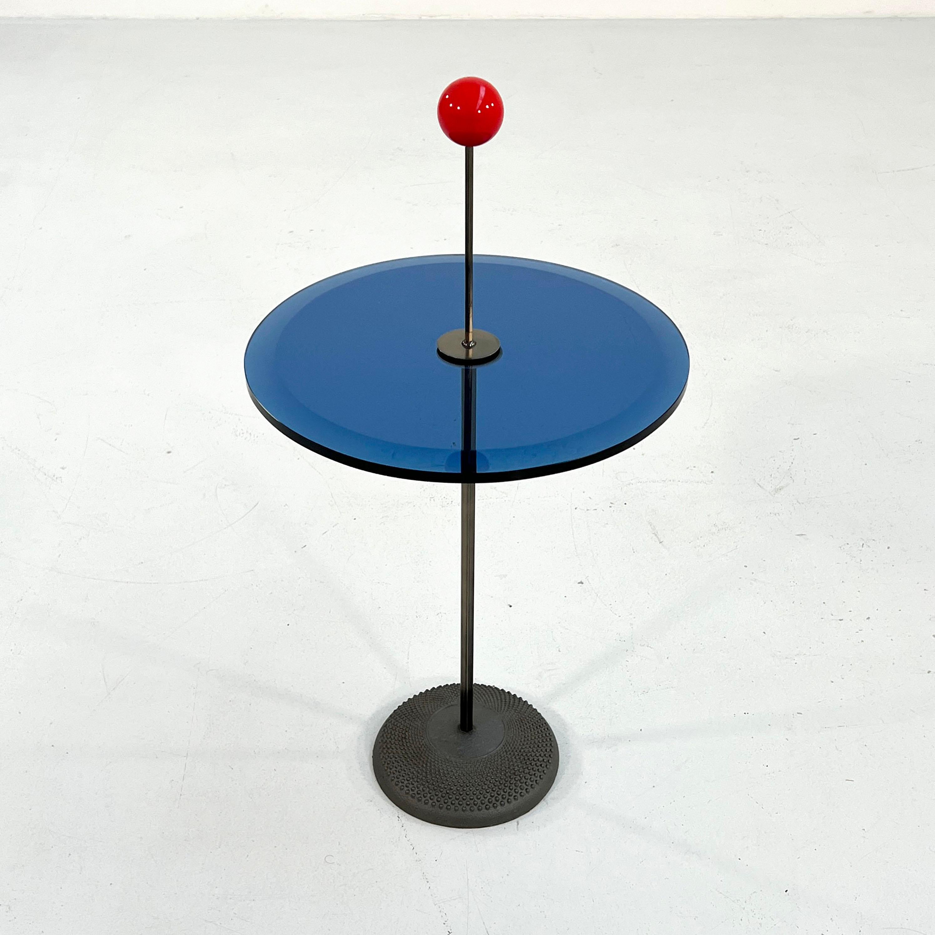 Designer - Pierluigi Cerri
Producer - Fontana Arte
Model - Orio Side Table
Design Period - Eighties
Measurements - Width 35 cm x Depth 35 cm x Height 70 cm 
Materials - Glass, Steel 
Color - Red, Blue, Black, Grey 
Light wear consistent with