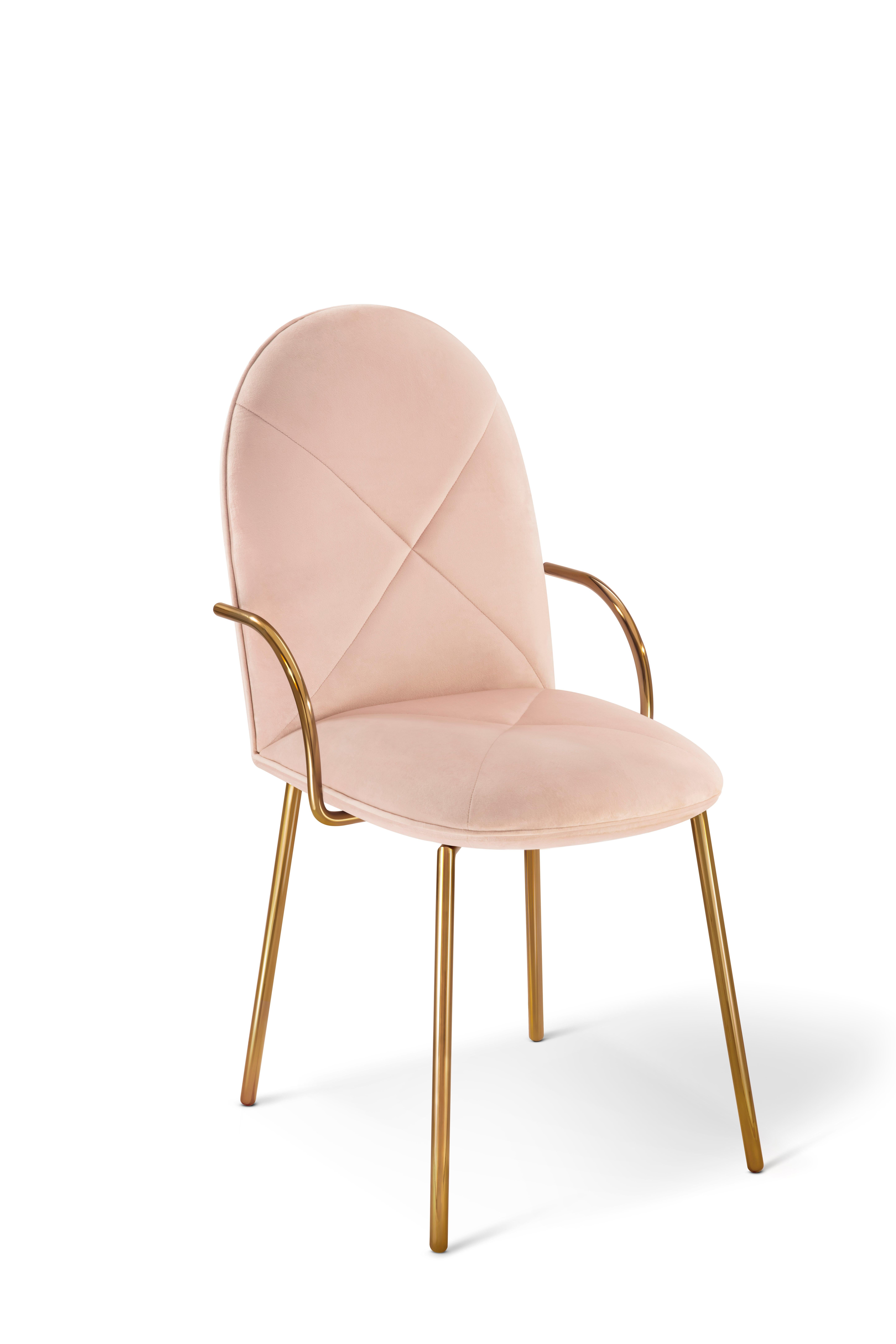 Orion Dining Chair with Plush Pink Velvet and Gold Arms by Nika Zupanc is a beautiful chair in pink velvet contrasted with luxurious gold trims. Ultra-chic in any interior space.

Nika Zupanc, a strikingly renowned Slovenian designer, never shies