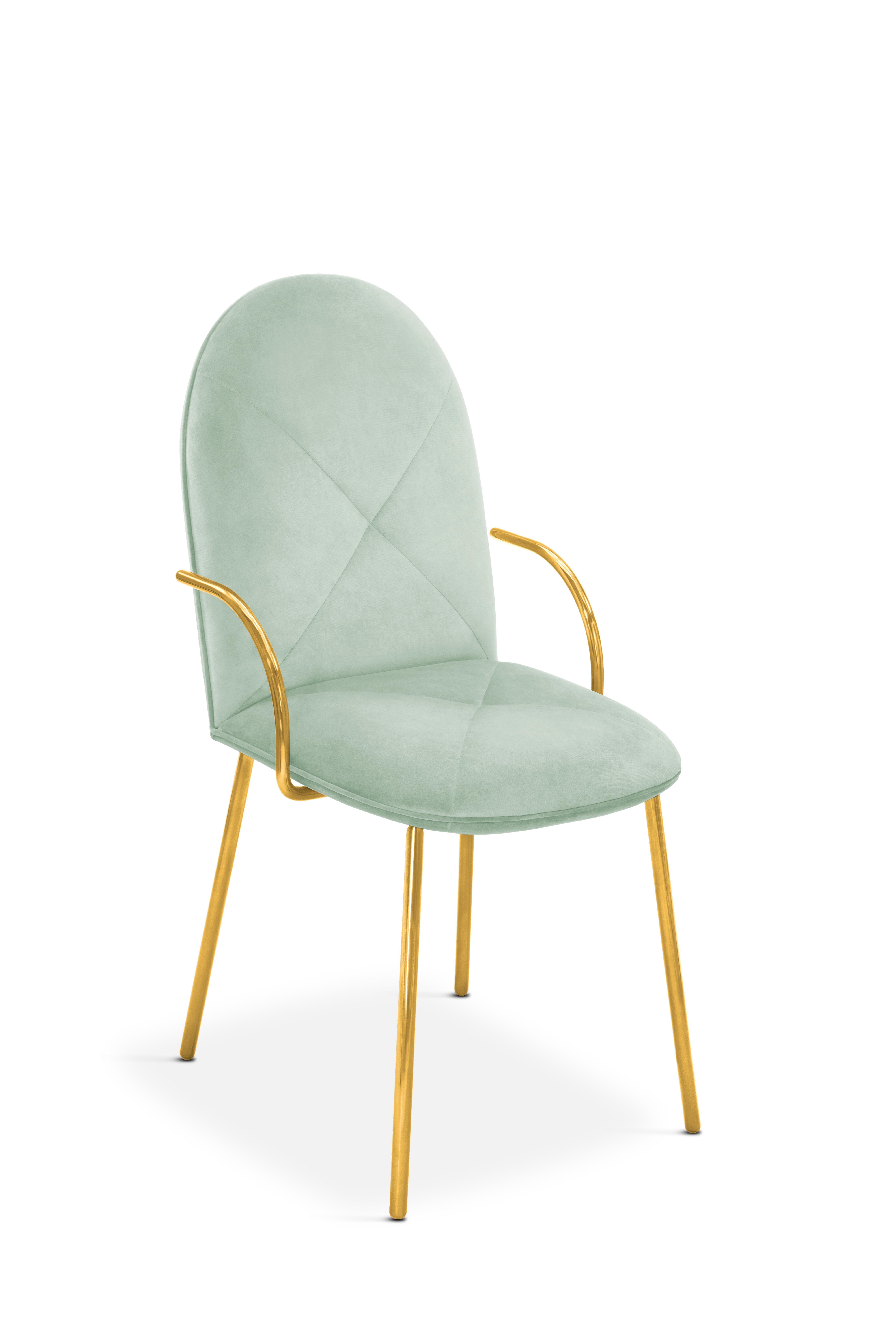 Orion Dining Chair with Plush Mint Green Velvet and Gold Arms by Nika Zupanc is a beautiful chair in pale green velvet and gold metal. Used as an accent or dining chair, it is stylish and comfortable.

Nika Zupanc, a strikingly renowned Slovenian
