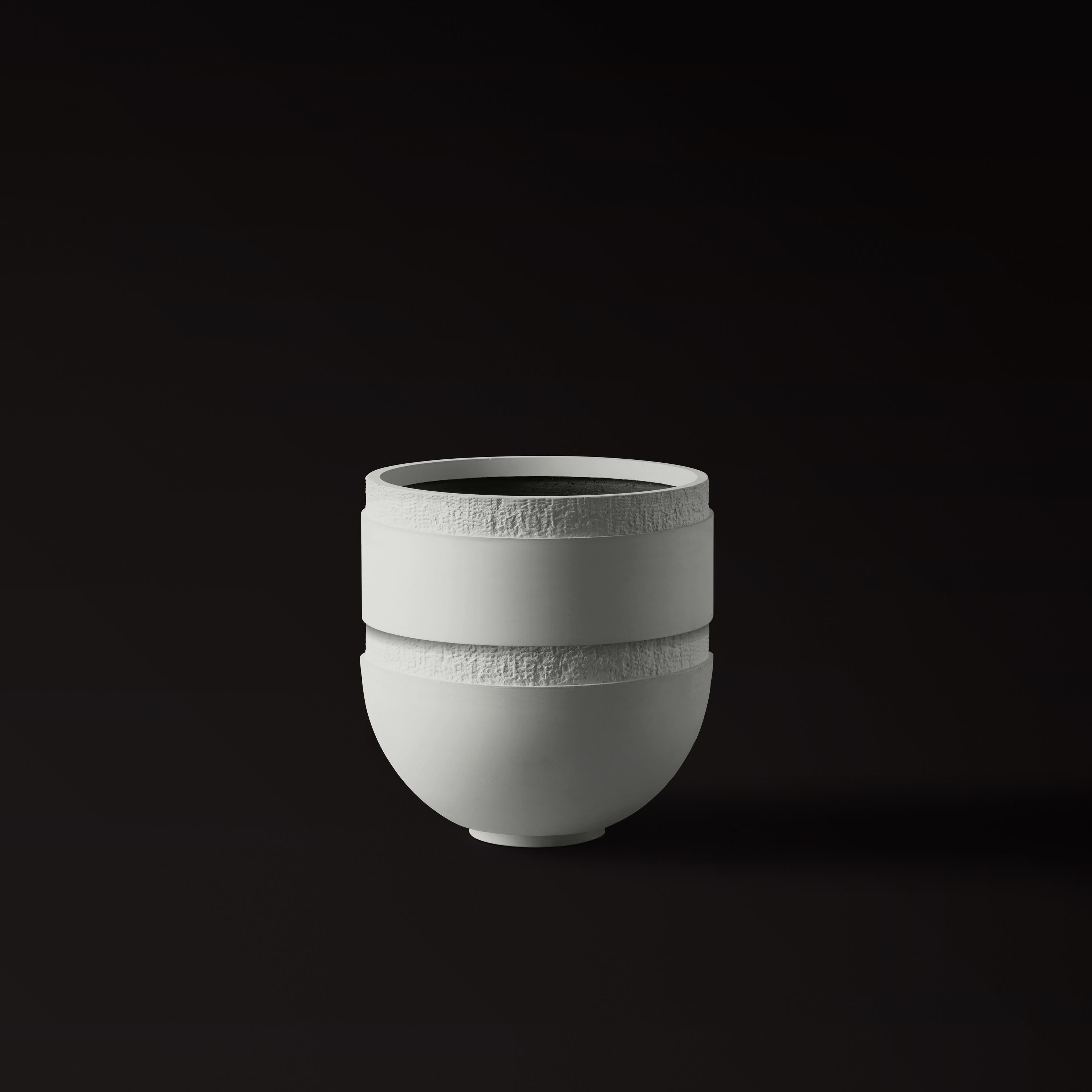 ORION II by Sirak. 
Urn Planter in Cast Concrete

A pure cylindrical column culminates in a half sphere, distilling ORION into a minimalist form—simple yet versatile. 

The planter can accommodate ornamental plants of all sizes as well as small