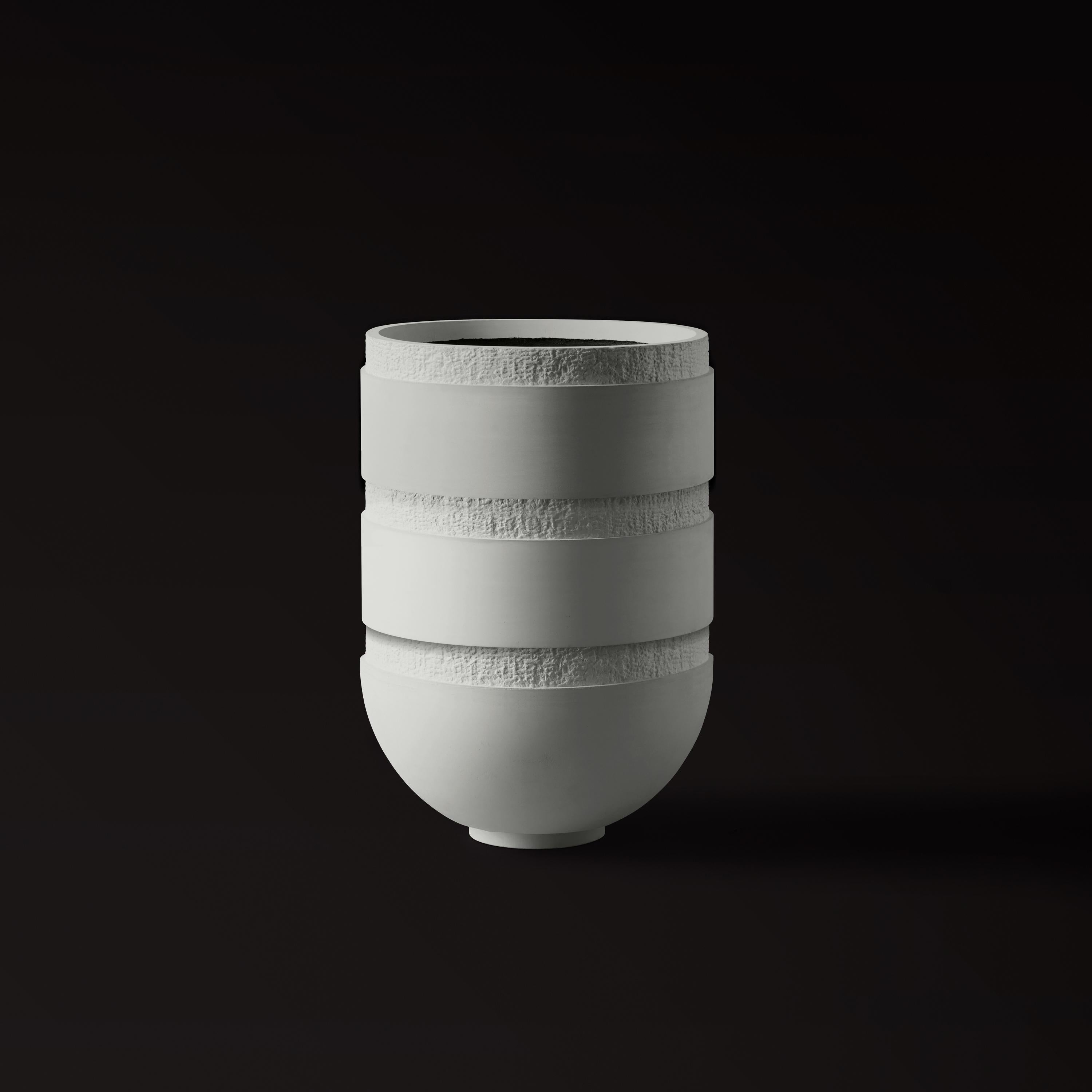 ORION III by Sirak. 
Urn Planter in Cast Concrete

A pure cylindrical column culminates in a half sphere, distilling ORION into a minimalist form—simple yet versatile. 

The planter can accommodate ornamental plants of all sizes as well as small