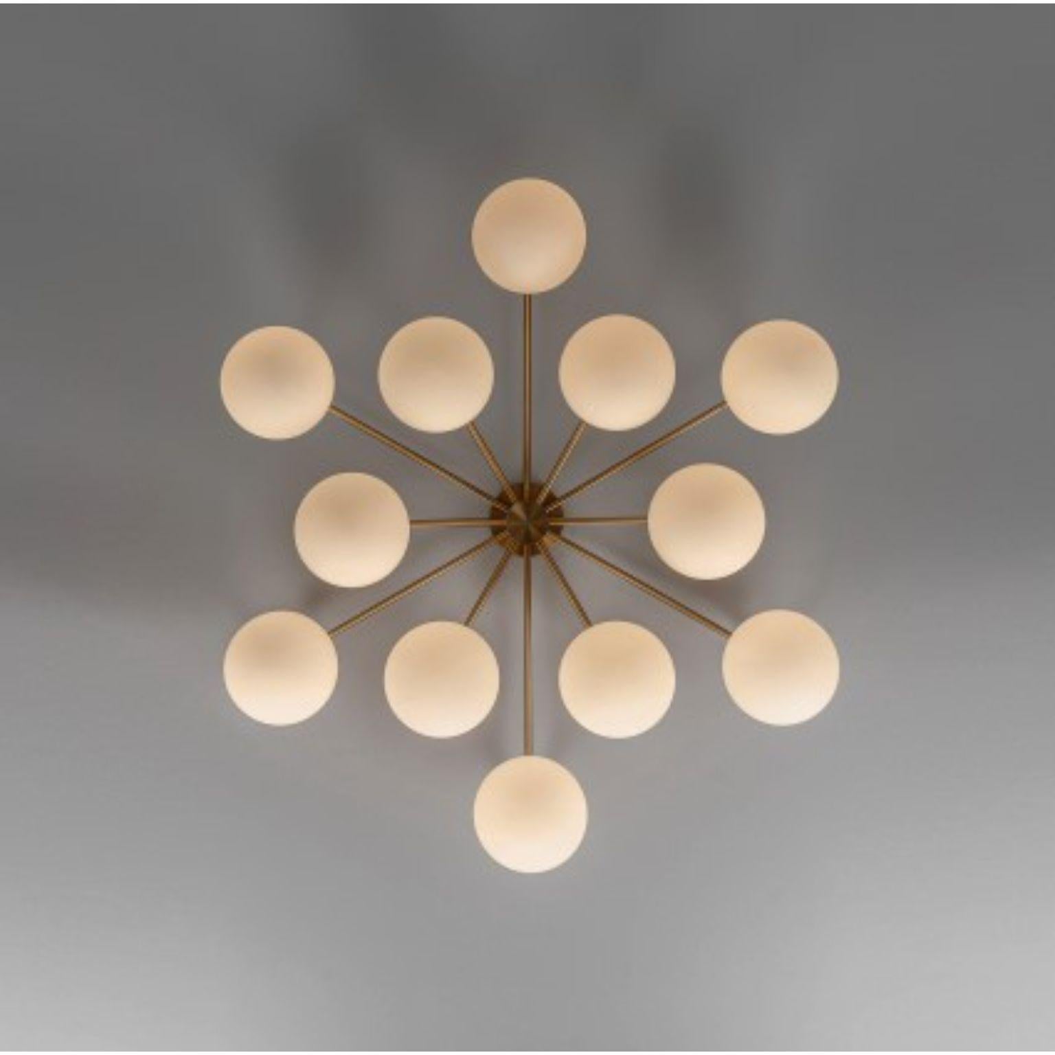 Orion round chandelier by Schwung
Dimensions: D 121.4 x H 122.5cm
Materials: Brass, Opal glass
Weight: 22.6 kg

Finishes available: Black gunmetal, polished nickel, brass
Other sizes available.

 Schwung is a german word, and loosely defined, means