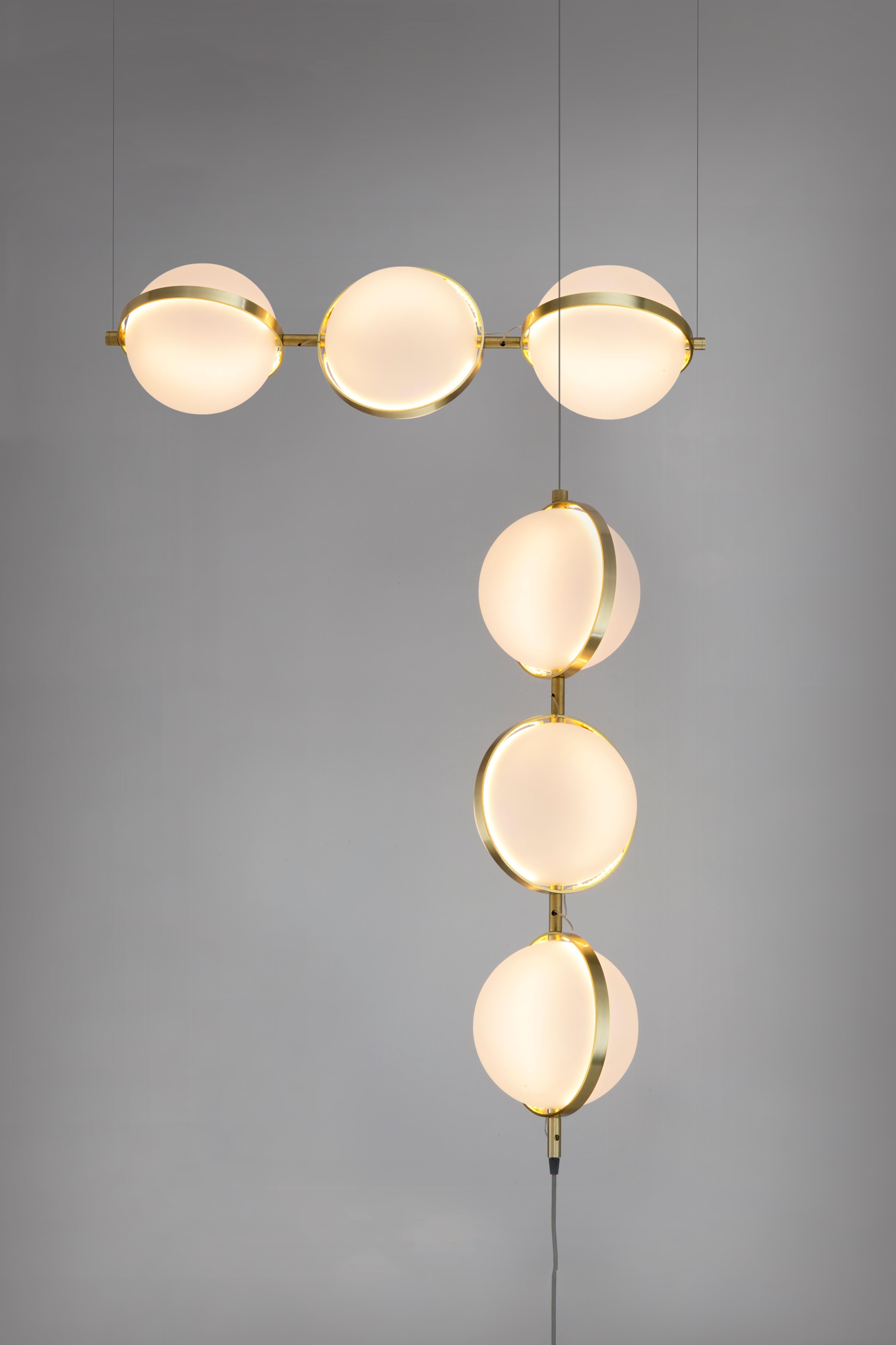 The Orion TX Pendant is one of the latest families in the evolution of the Flexus series by Baroncelli. 

Flexus is a lighting system that comprises a palette of abstracted lines, curves and circles. Echoing the language of modernist modular