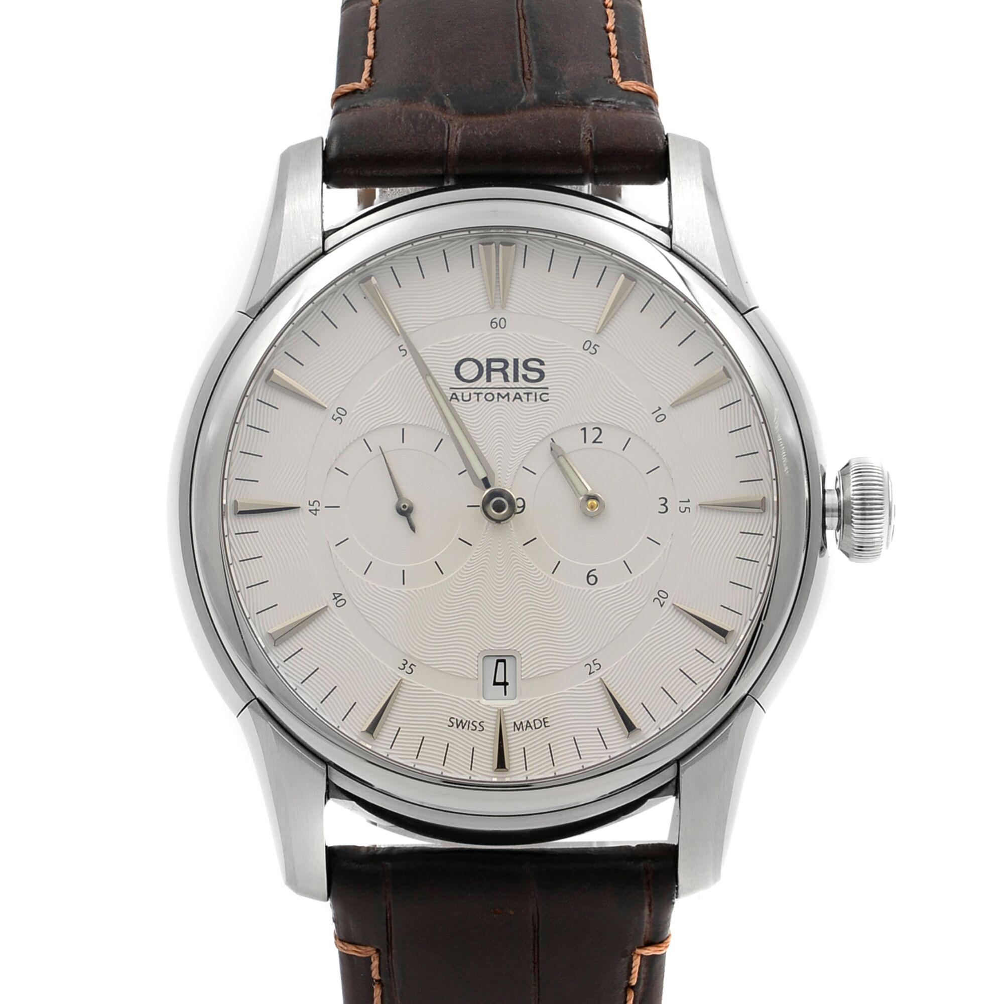 This display model Oris Artelier Regulateur  0169075814051 is a beautiful men's timepiece that is powered by mechanical (automatic) movement which is cased in a stainless steel case. It has a round shape face, date, small seconds subdial dial and