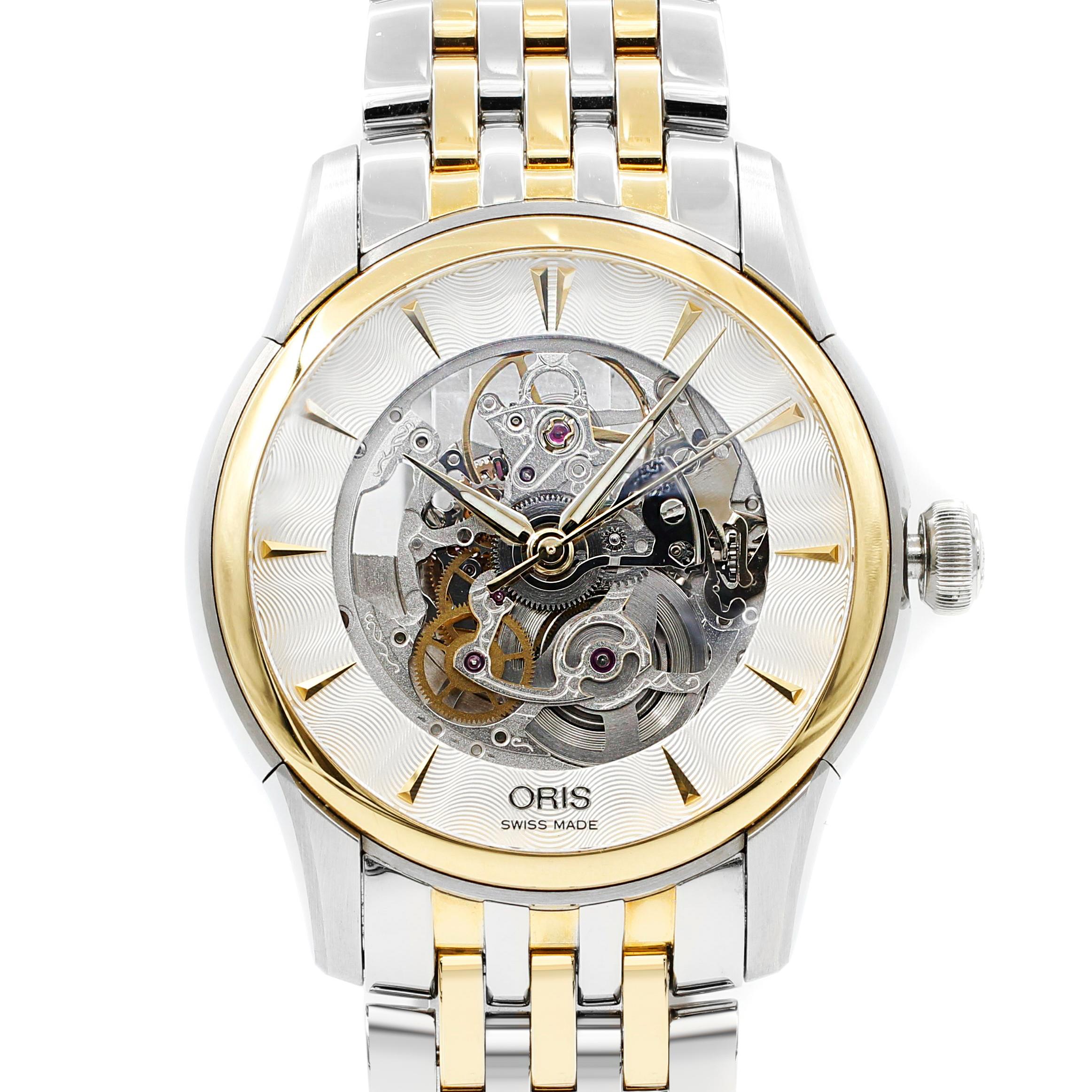 This pre-owned Oris Artelier  734-7670-4351 is a beautiful men's timepiece that is powered by mechanical (automatic) movement which is cased in a stainless steel case. It has a round shape face, no features dial and has hand sticks style markers. It