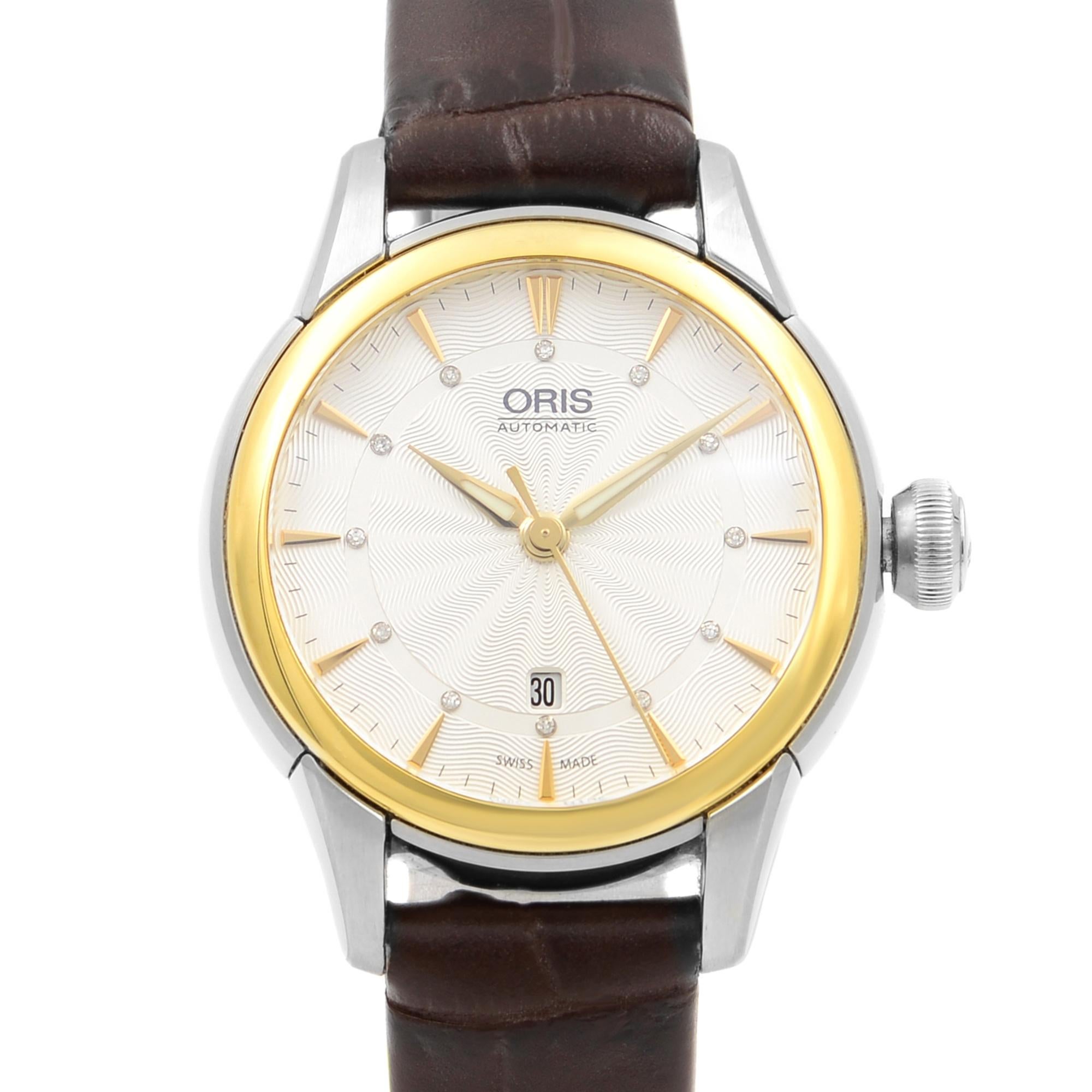 This pre-owned Oris Artelier 01 561 7687 4351-07 5 14 70FC is a beautiful Ladie's timepiece that is powered by mechanical (automatic) movement which is cased in a stainless steel case. It has a round shape face, date indicator dial and has hand