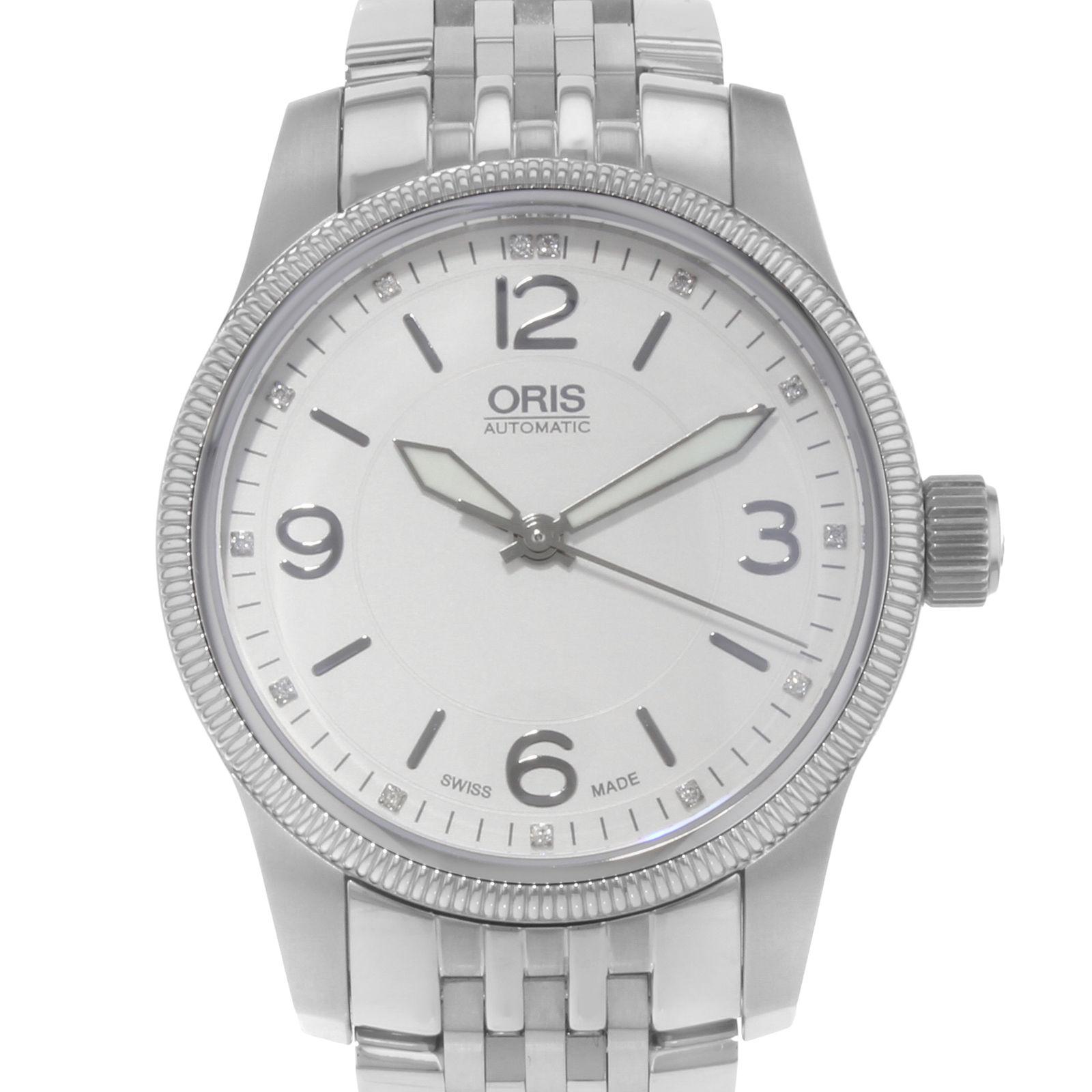 (16373)
This display model Oris Big Crown 0173376494031 is a beautiful men's timepiece  in a stainless steel case. It has a round shape face, dial and has hand sticks & numerals style markers. It is completed with a stainless steel band that opens