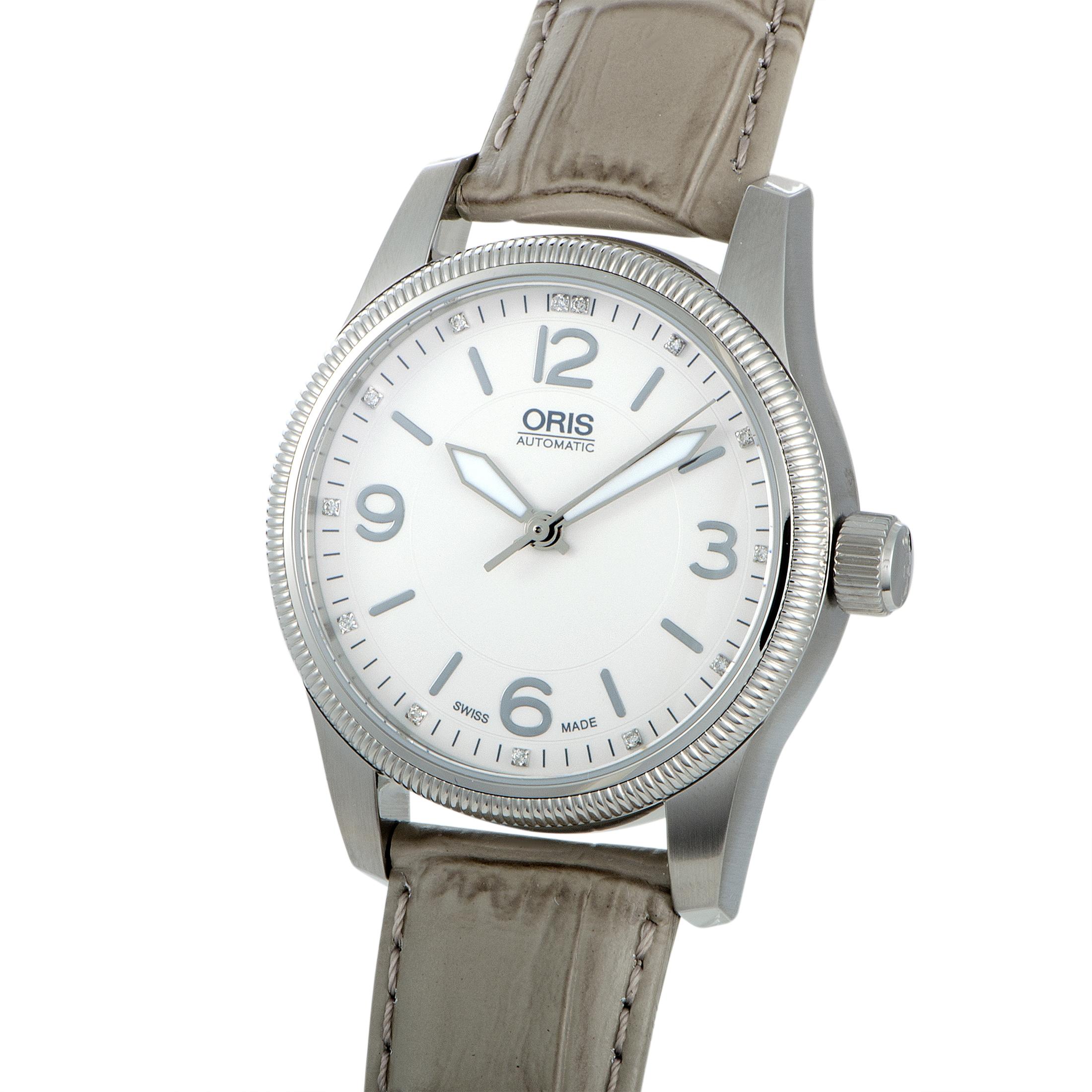 This is the Oris Big Crown, reference number 01 733 7649 4031.

It is presented with a stainless steel case that boasts see-through back and offers water resistance of 100 meters. The case is mounted onto a gray leather strap fitted with a tang