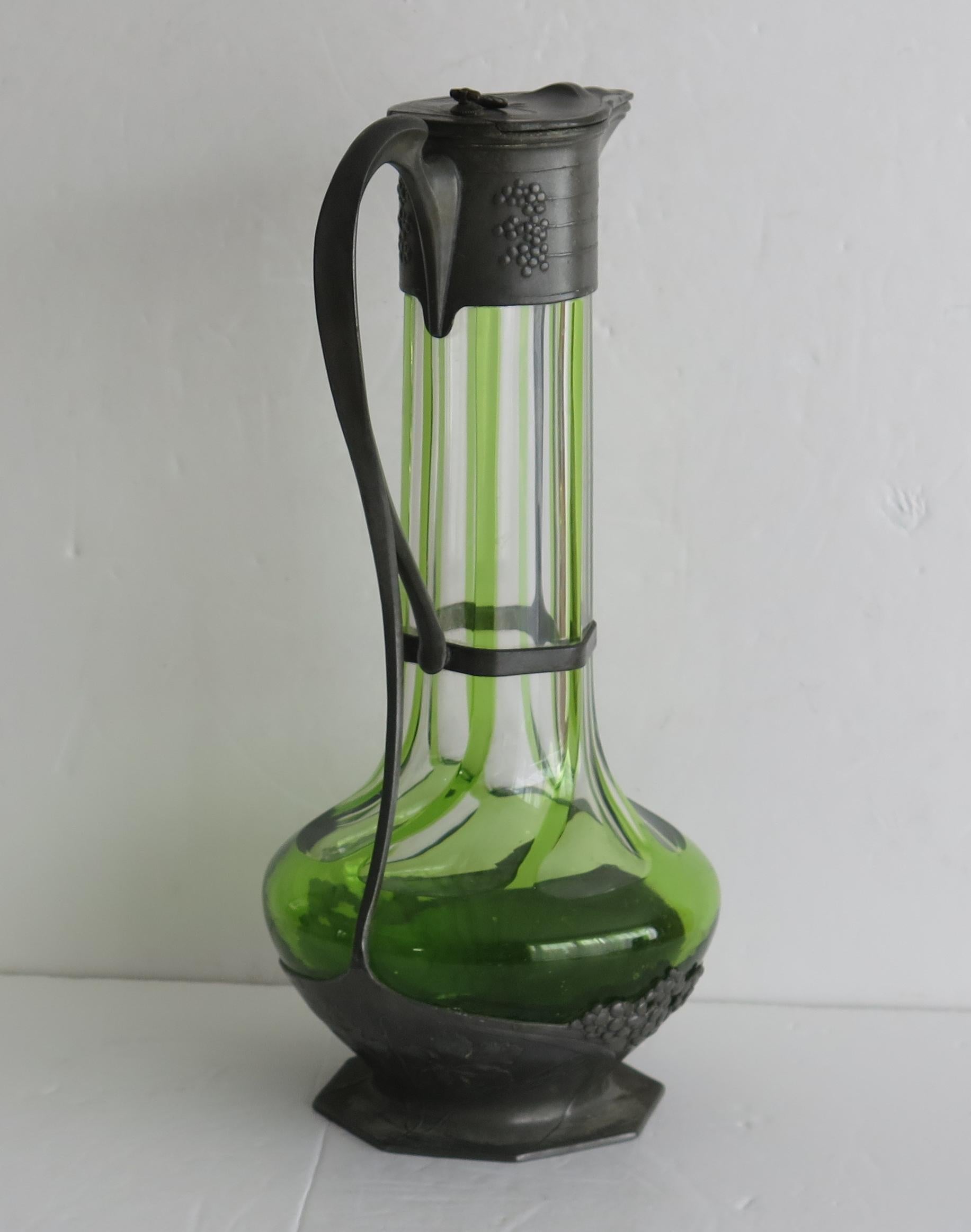 Hammered Orivit Pewter Encased Claret Jug Green Glass, Art Nouveau, Germany, 1900 For Sale