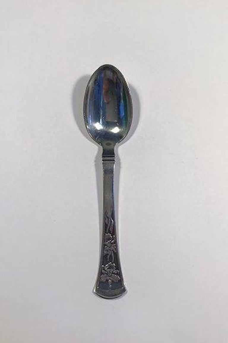 Orkide/orchid silver child spoon horsens silversmithy.

Measures: L 15.3 cm/6.02