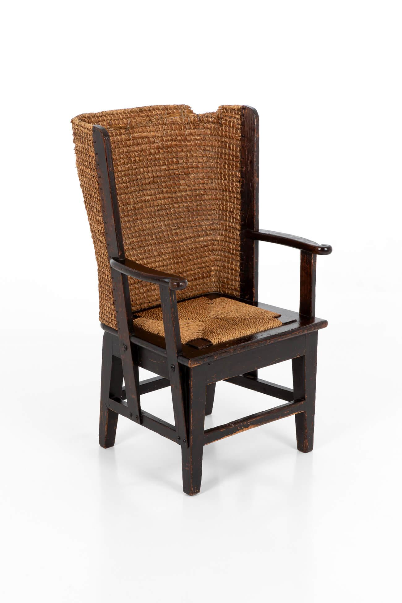 A diminutive Orkney chair in stained Scottish pine. Made with oat straw with a drop-in rush seat on tapering legs. Sympathetic historical restorations only add to the charm of this beautiful chair. 
Scottish, circa 1900.

Additional