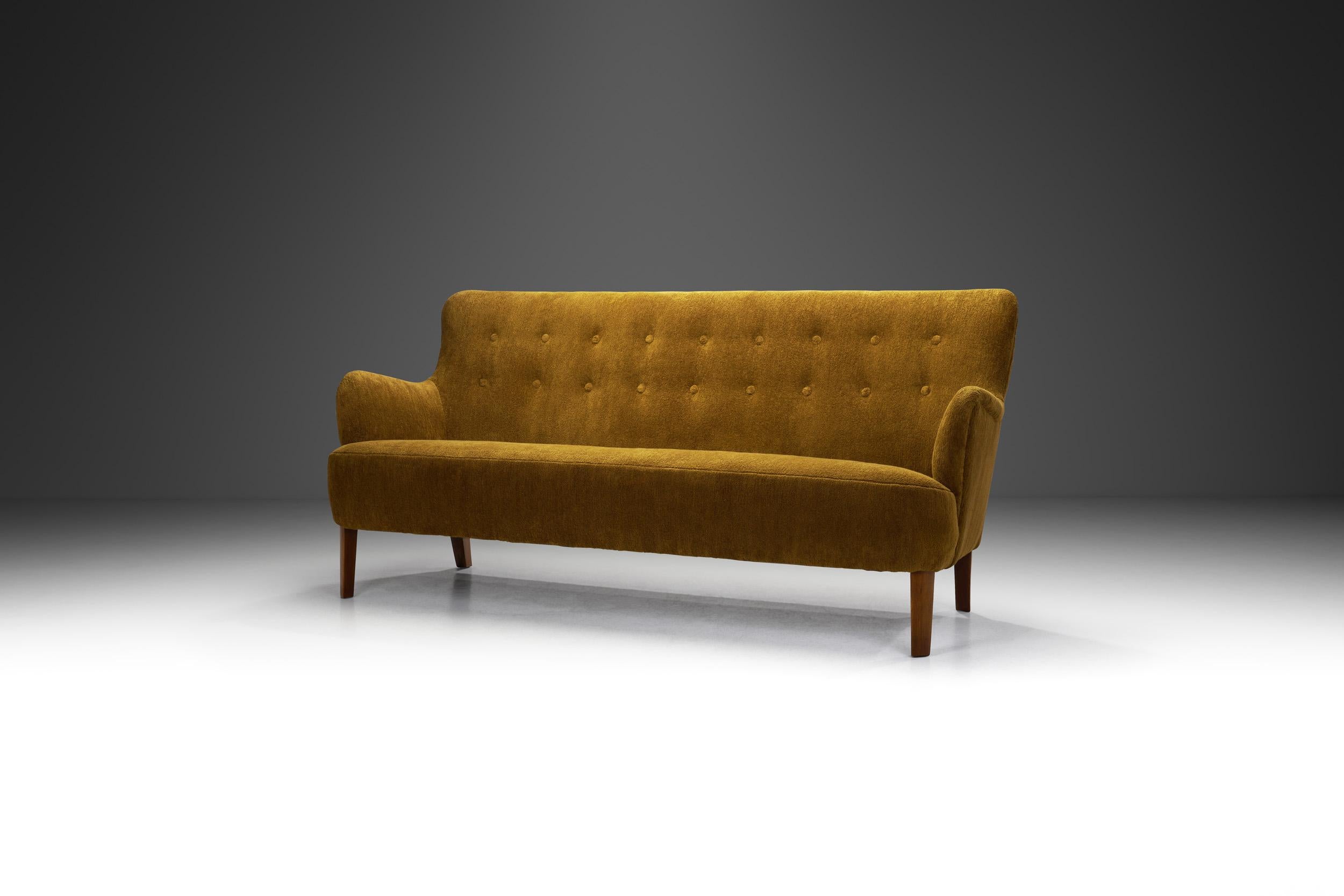 Orla Mølgaard-Nielsen's significant work has been mainly carried out together with his partner, fellow Danish architect-designer, Peter Hvidt, but the designer’s earlier models -like this sofa - are widely renowned for their understated elegance and
