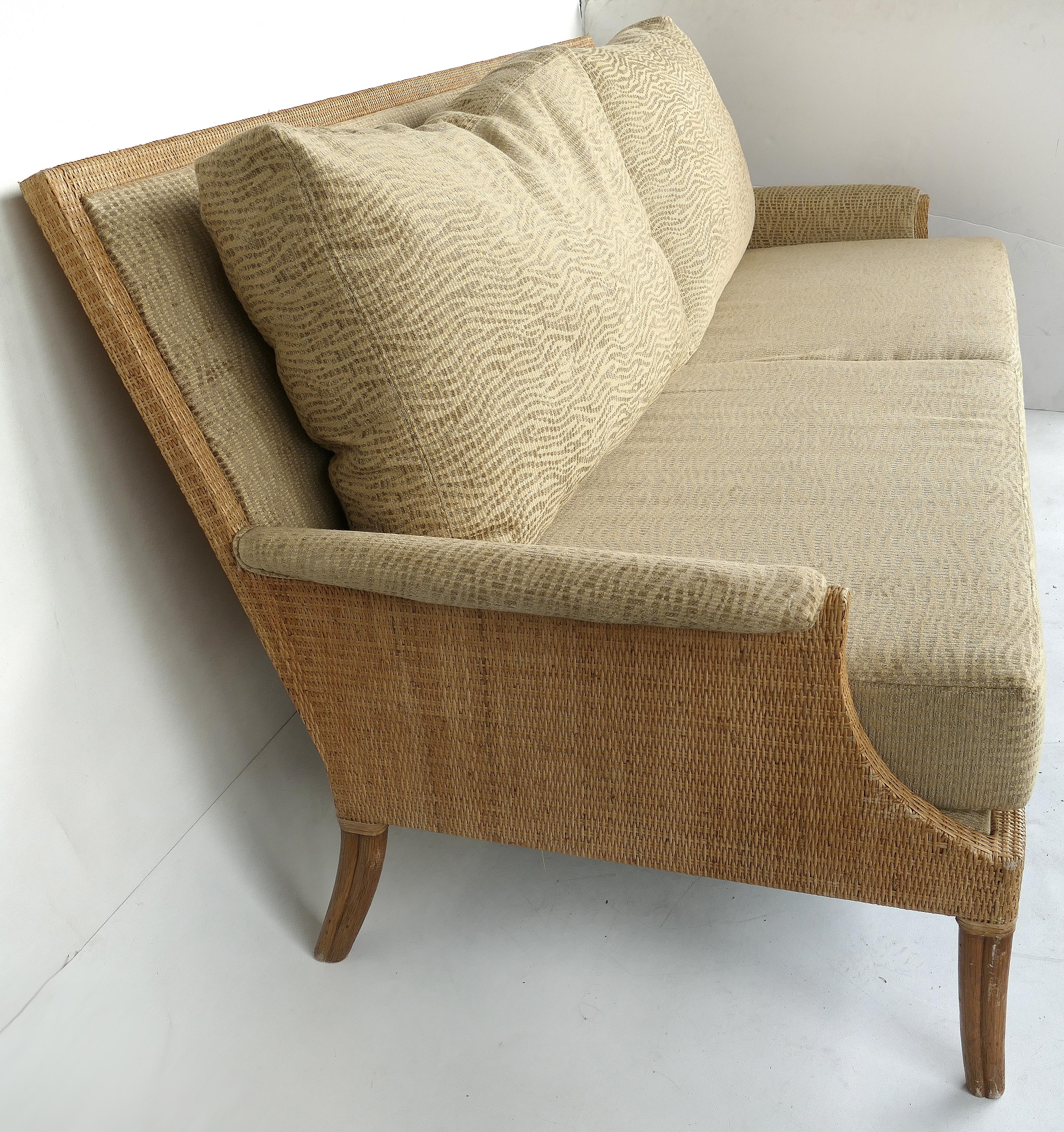 Orlando Diaz for Azcuy McGuire Furniture Reed sofa 

Offered for sale is a McGuire Furniture of San Francisco reed and wood sofa designed by Orlando Diaz Azcuy. This deep and comfortable sofa has woven reed sides and back supported by a wood base.