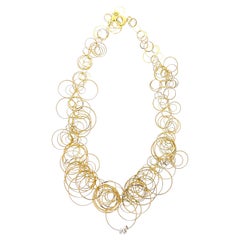 Orlando Orlandini - Collana a cerchi sovrapposti con diamanti e oro 18k bicolore