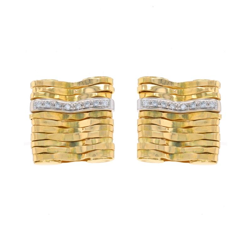 Brand: Orlando Orlandini

Metal Content: 18k Yellow Gold & 18k White Gold

Stone Information

Natural Diamonds
Carat(s): .16ctw
Cut: Round Brilliant
Color: E - F
Clarity: VS1 - VS2

Total Carats: .16ctw

Style: Large Stud
Fastening Type: Butterfly