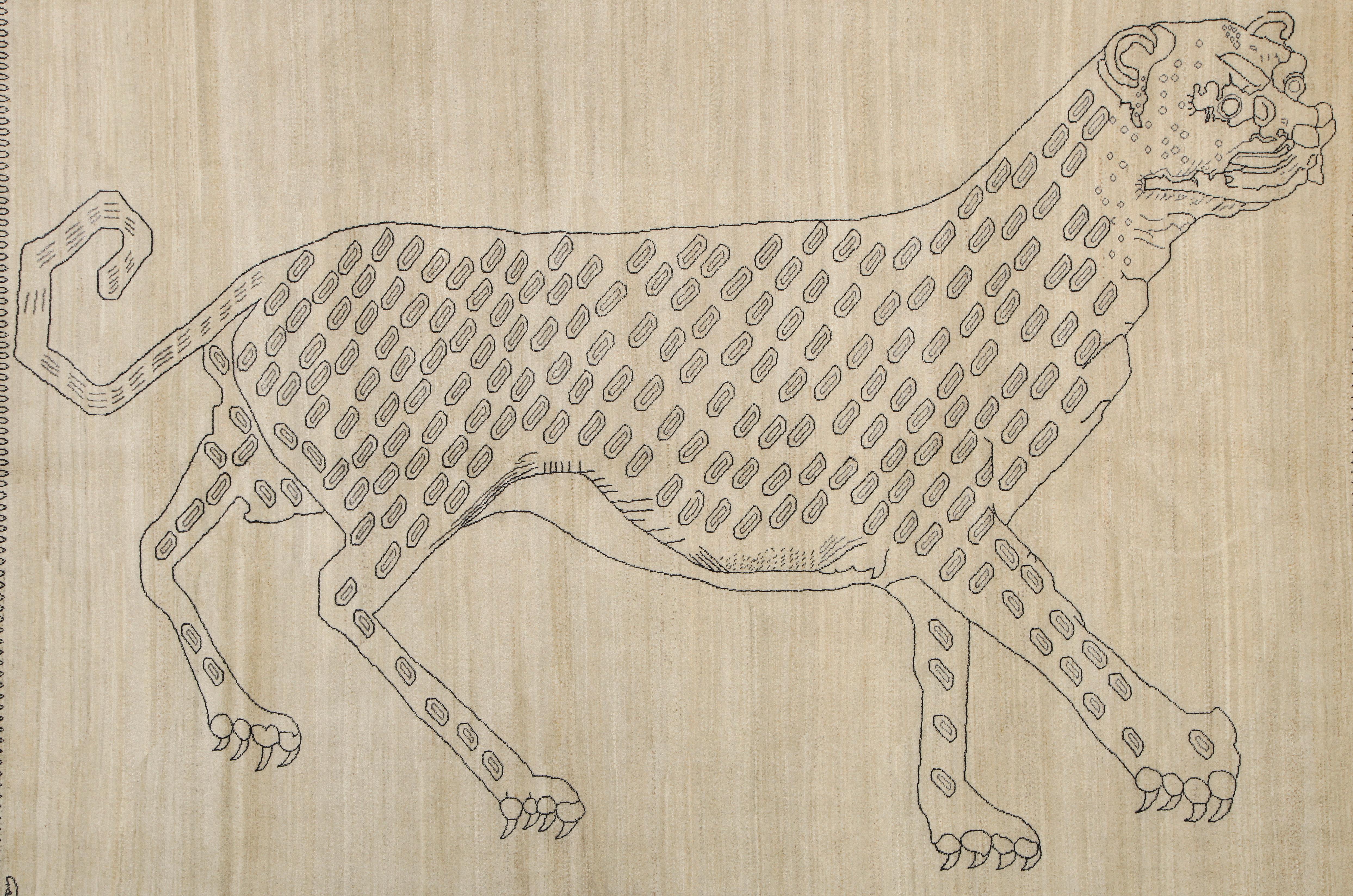 Hand knotted with pure wool and silk highlights, this 6' x 9' Persian leopard rug by Orley Shabahang will watch over your home for generations. The leopard's graceful form seems to prowl across the rug's expanse, its rich hues of cream and gray