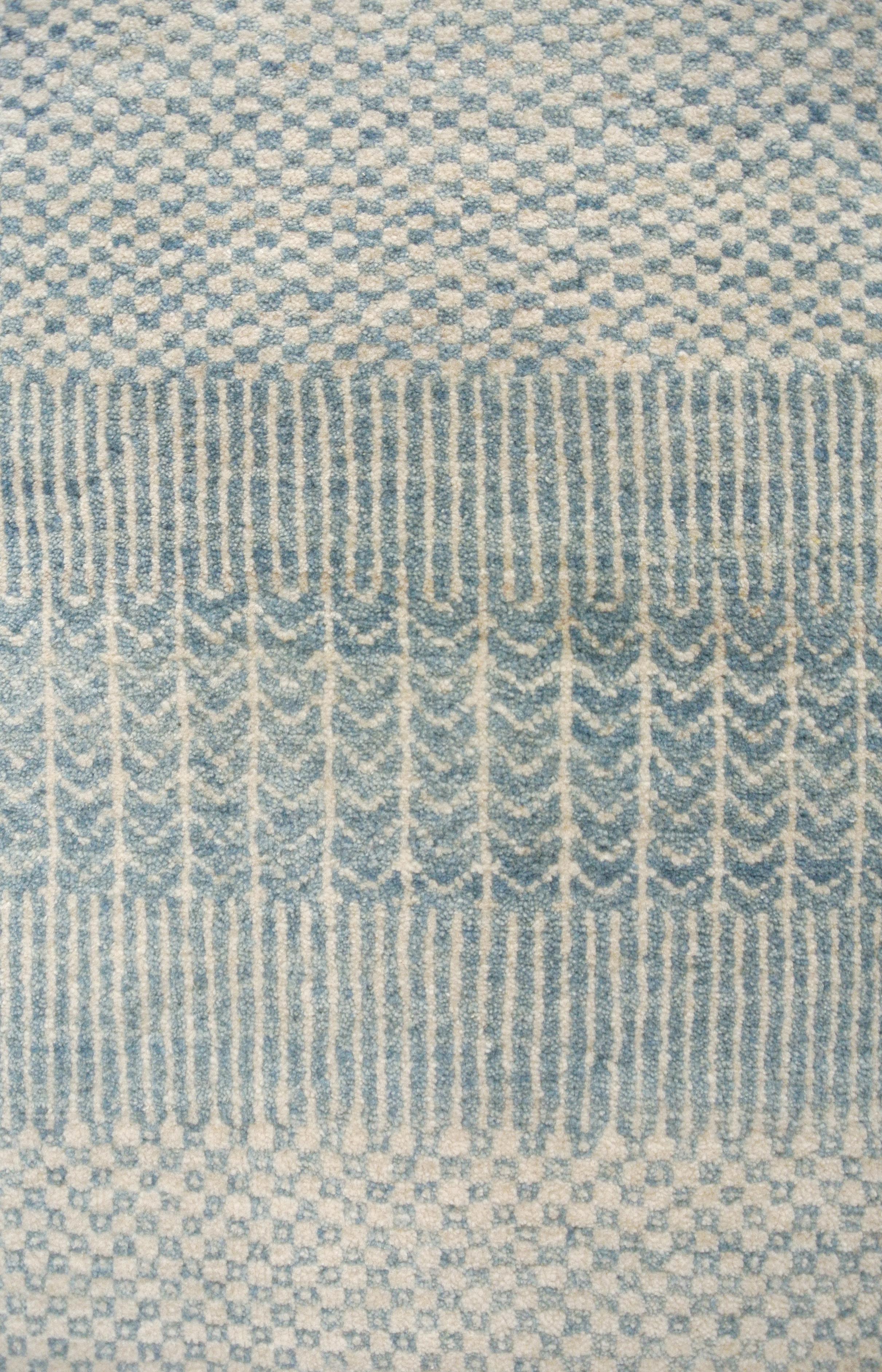 This 5’ x 7’ Orley Shabahang signature “Rain” carpet showcases a modern design in a hand knotted Persian weave. This carpet, from the Orley Shabahang Rain collection, features a simple pattern made from pure handspun wool and organic dyes that