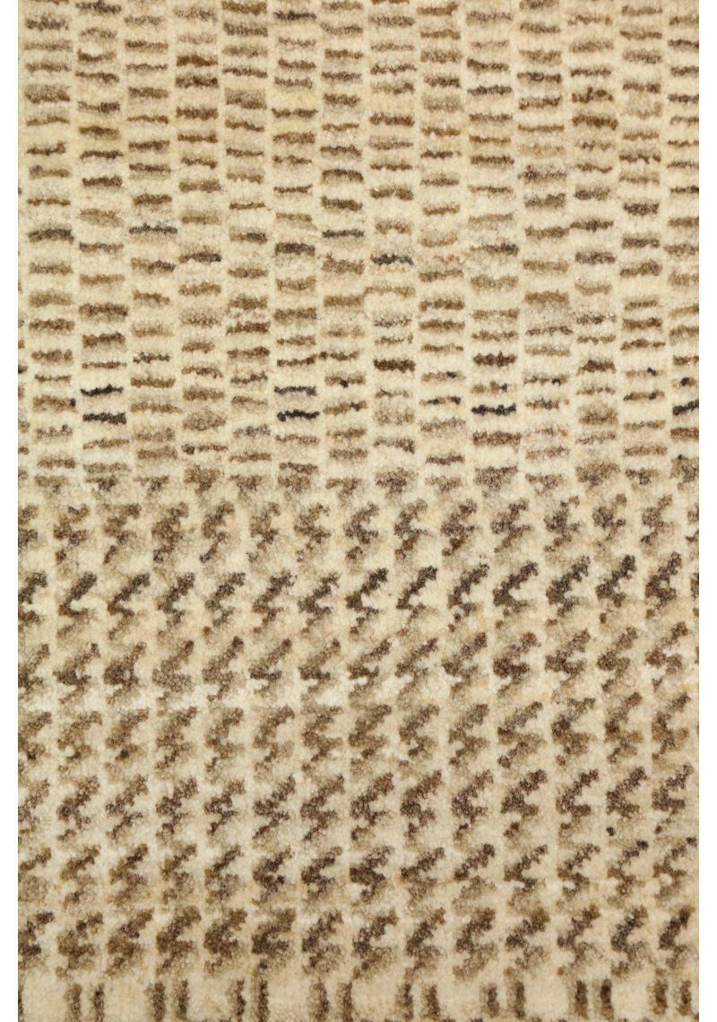 This 2’ x 4’ Orley Shabahang signature “Rain” carpet showcases a modern design in a hand-knotted Persian weave. This carpet, from the Orley Shabahang Rain collection, features a simple pattern made from pure handspun wool and organic dyes that