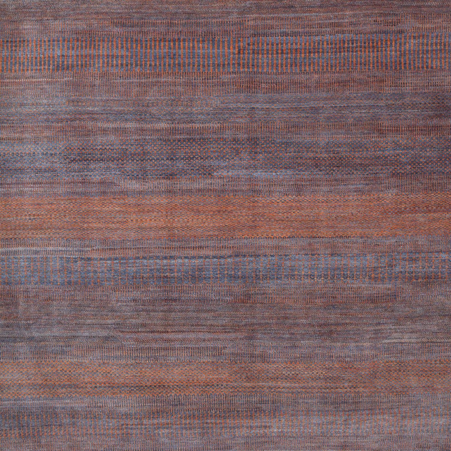 This Orley Shabahang signature “Rain No. 1” carpet in pure handspun wool and organic dyes showcases a modern design in a hand knotted Persian weave. This carpet features a simple pattern that symbolizes all the shapes that rain can take in a