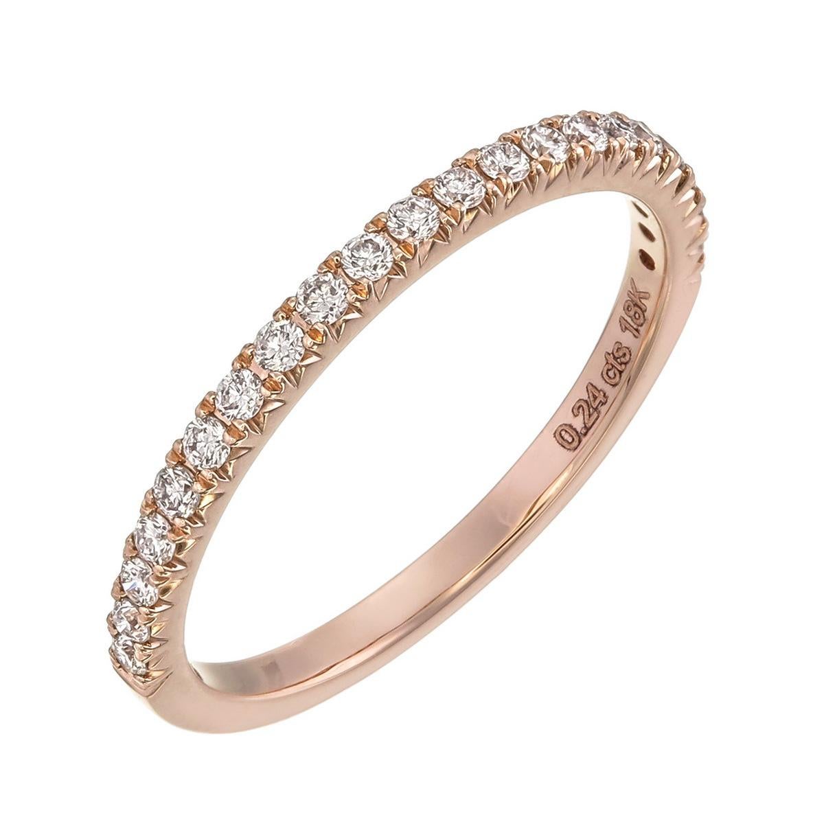 Orloff of Denmark;
This slender band of 18 Karat rose gold is the quintessence of understated elegance. Encrusted with 21 SI2, F color diamonds, it radiates a soft, rosy hue that complements the fire of the stones. Ideal for stacking or as a