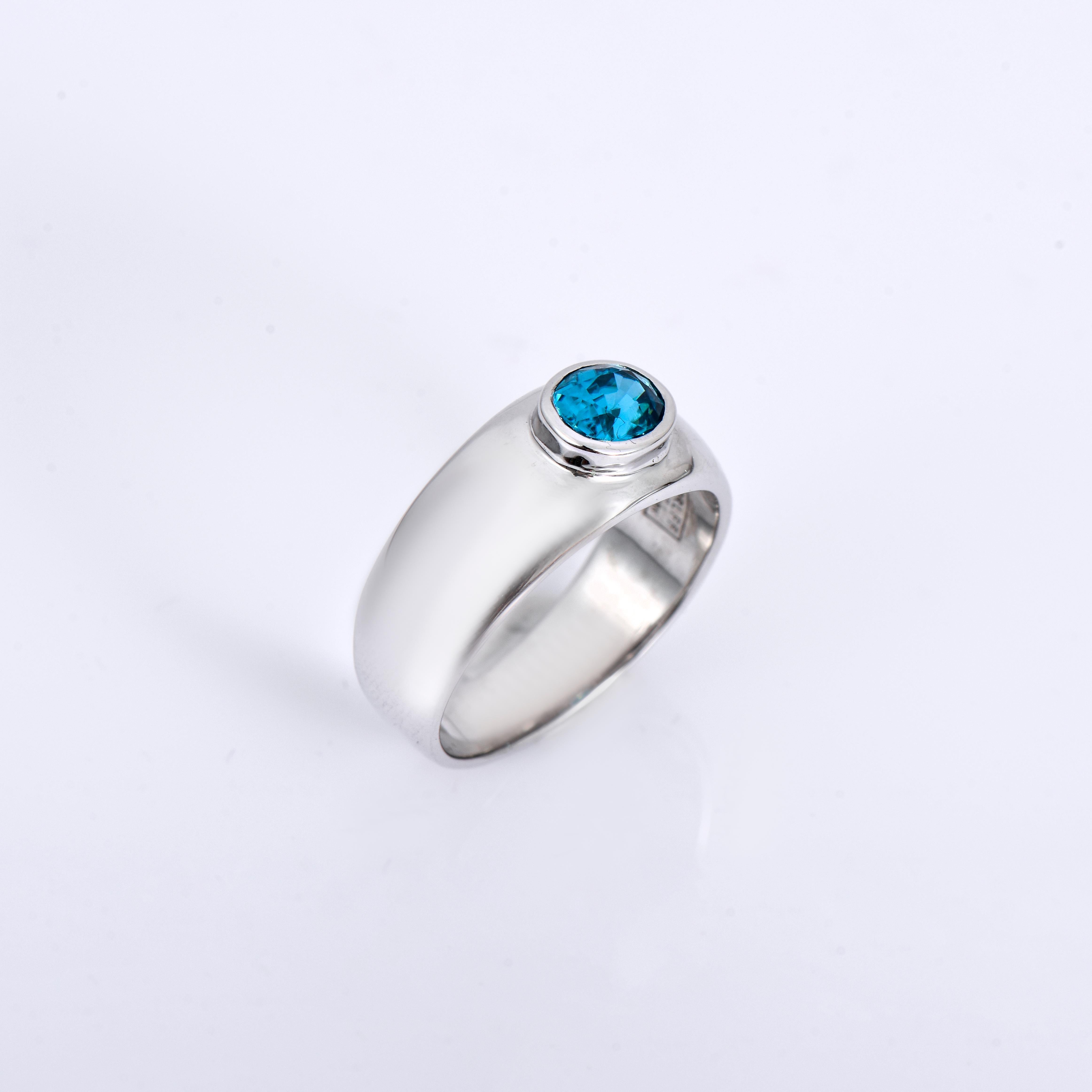 Orloff of Denmark; 925 Sterling Silver Ring set with a 1.3 carat Natural Cambodian Blue Zircon.

This piece has been meticulously hand-crafted out of 925 sterling silver.
It's adorned with a single Cambodian blue zircon. The zircon is oval-cut and