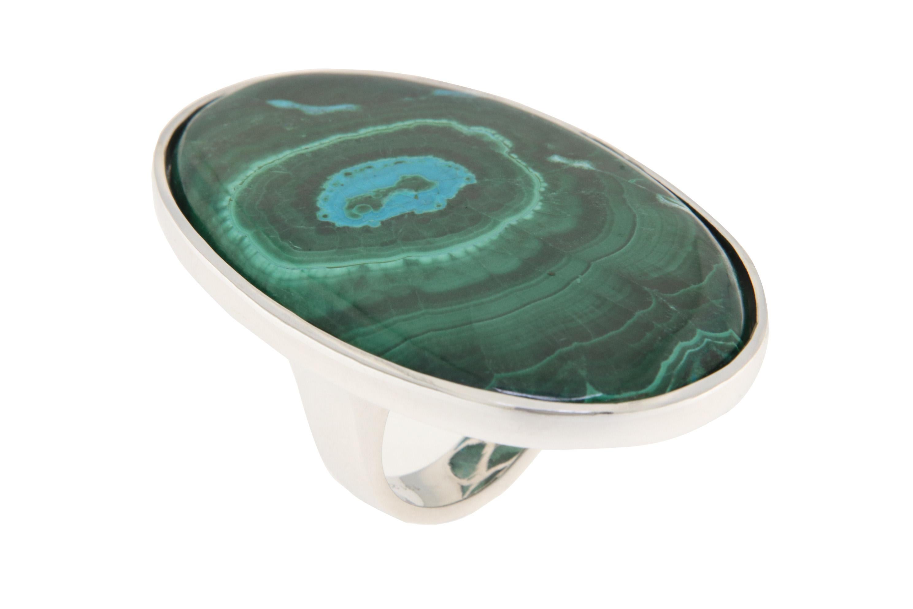 Orloff of Denmark; 131 carat Azurite-Malachite Ring fashioned out of 925 Sterling Silver.

This statement ring features a stunning 131-carat azurite-malachite gemstone, known for its rich and vibrant contrasting colors. The deep, almost velvety,