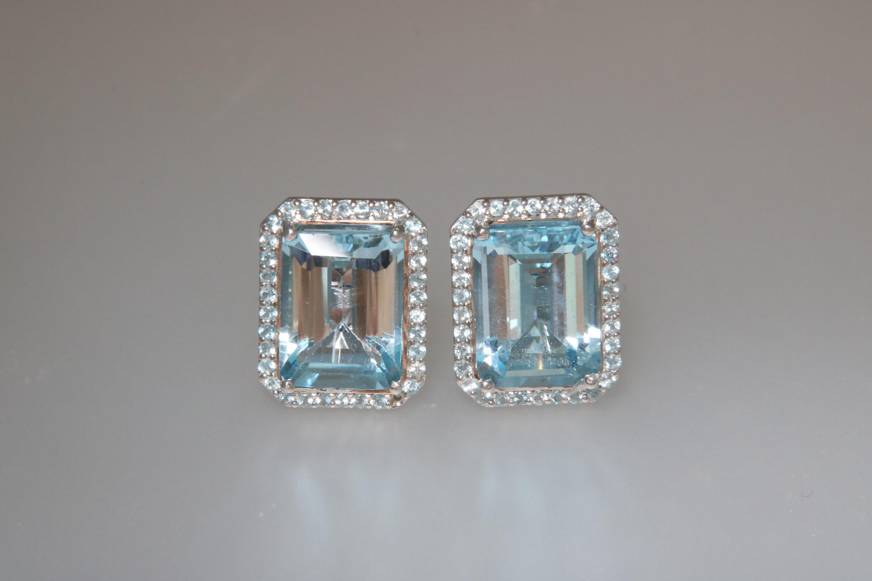 Contemporary Orloff of Denmark, 15 carat Blue Topaz Halo Earrings in 925 Sterling Silver For Sale