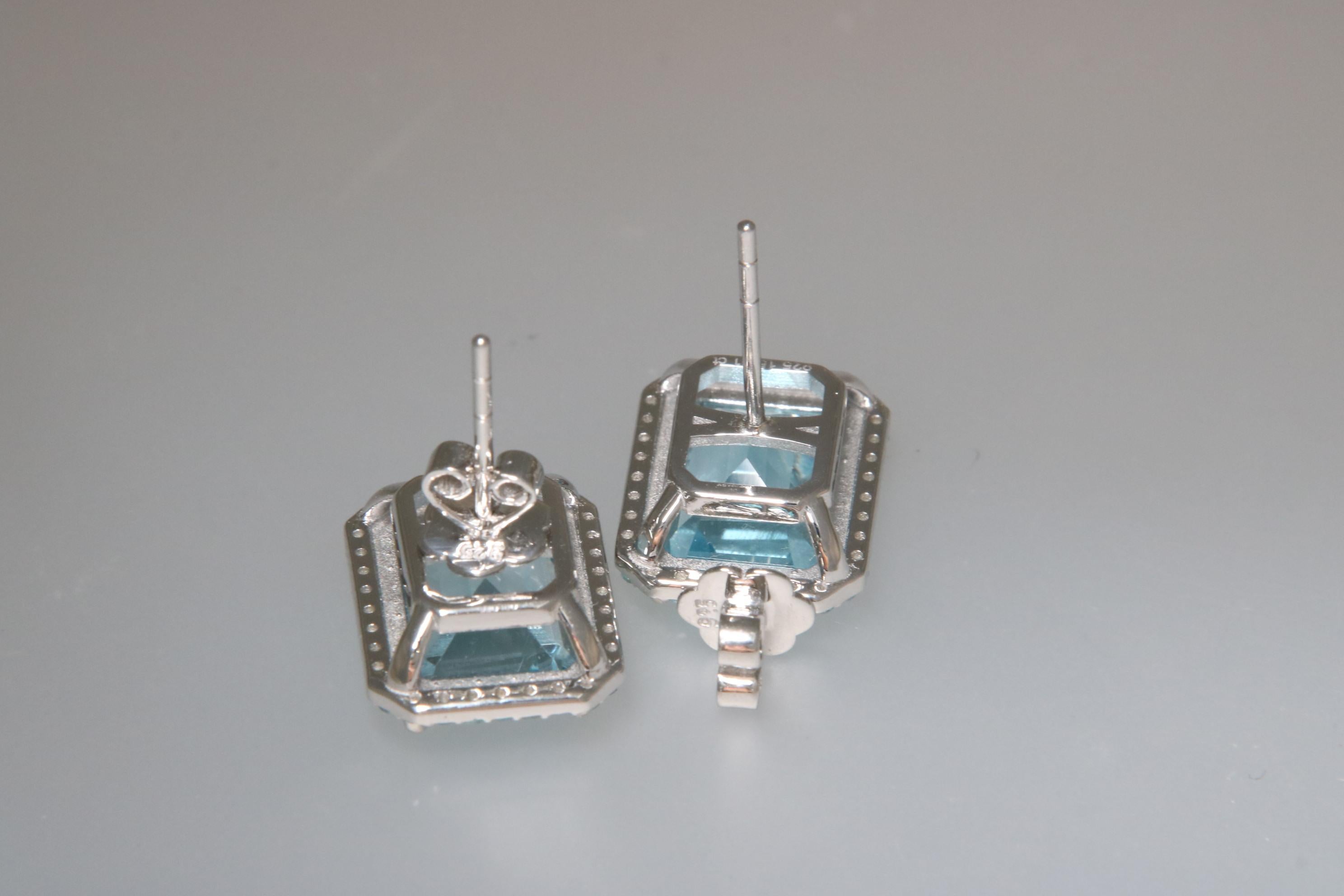Orloff of Denmark, 15 carat Blue Topaz Halo Earrings in 925 Sterling Silver In New Condition For Sale In Hua Hin, TH