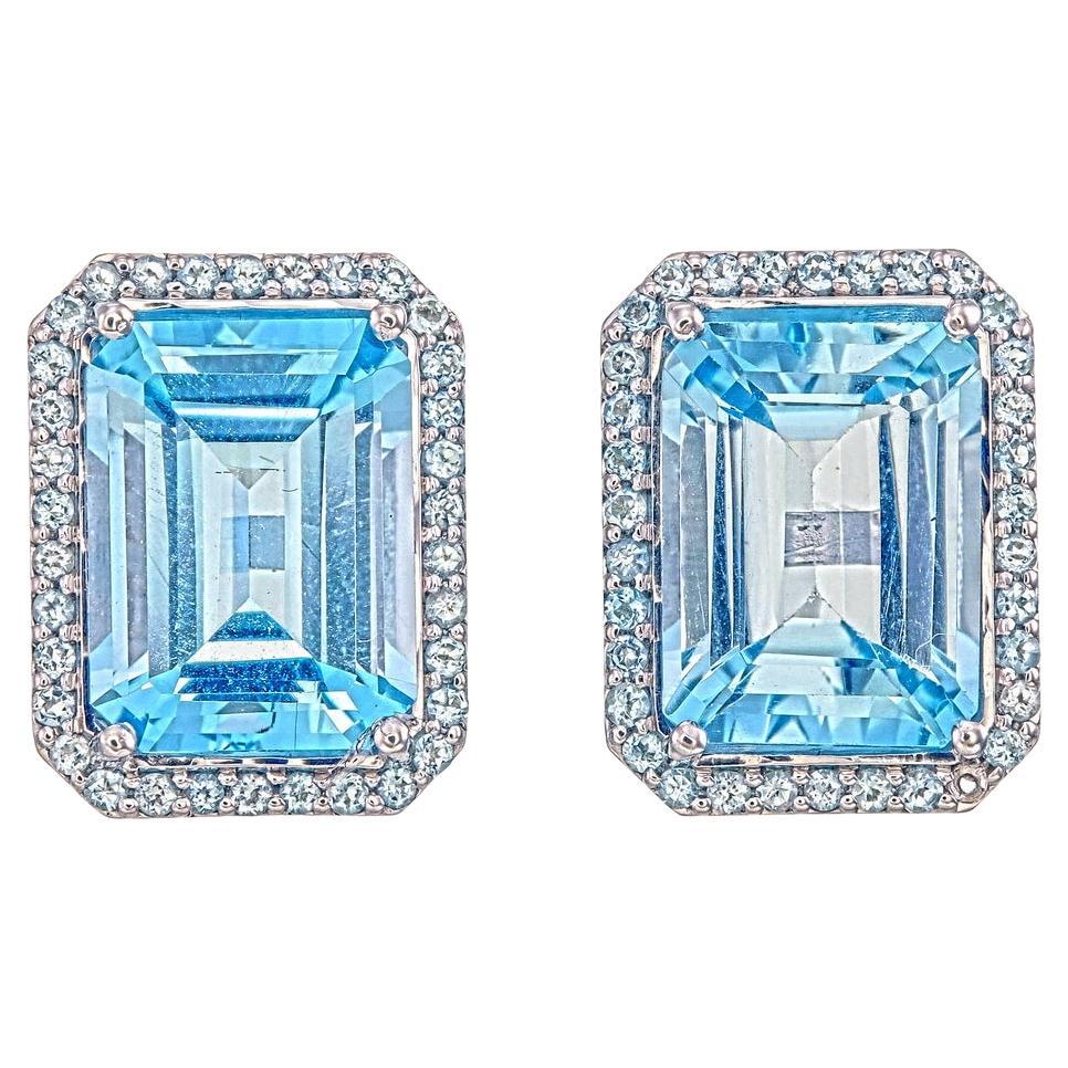 Orloff of Denmark, 15 carat Blue Topaz Halo Earrings in 925 Sterling Silver For Sale