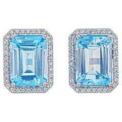 Orloff of Denmark, 15 carat Blue Topaz Halo Earrings in 925 Sterling Silver