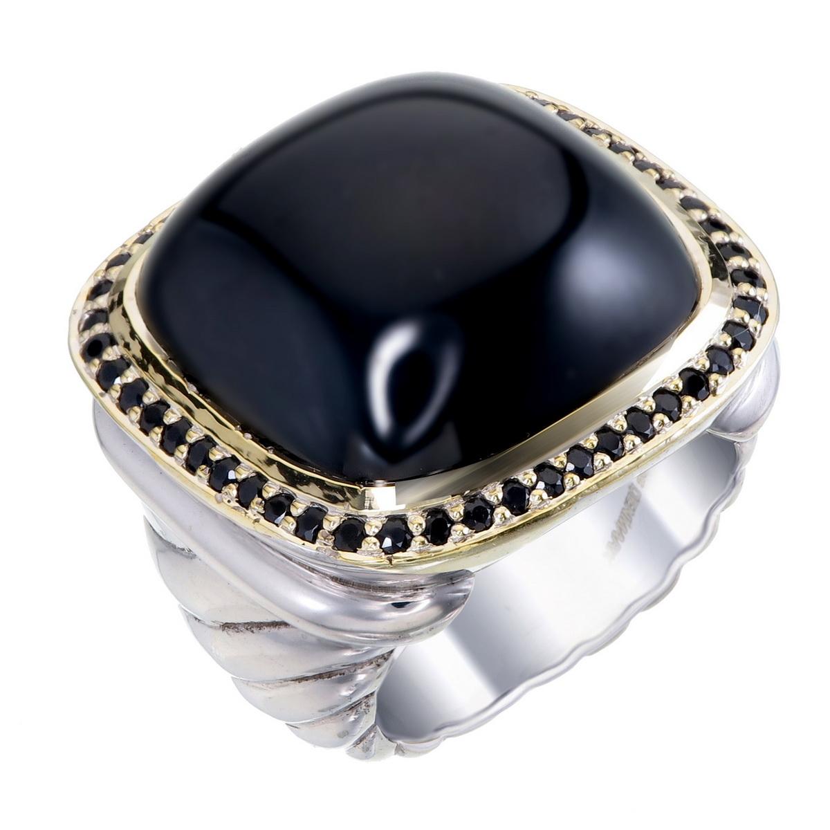 Orloff of Denmark; Sterling Silver Statement ring featuring a total of 0.50 carats of Black Sapphires surrounding a huge Onyx, set in an 18 Karat Gold-Plated bezel

Introducing a truly captivating piece, this statement ring is a stunning fusion of