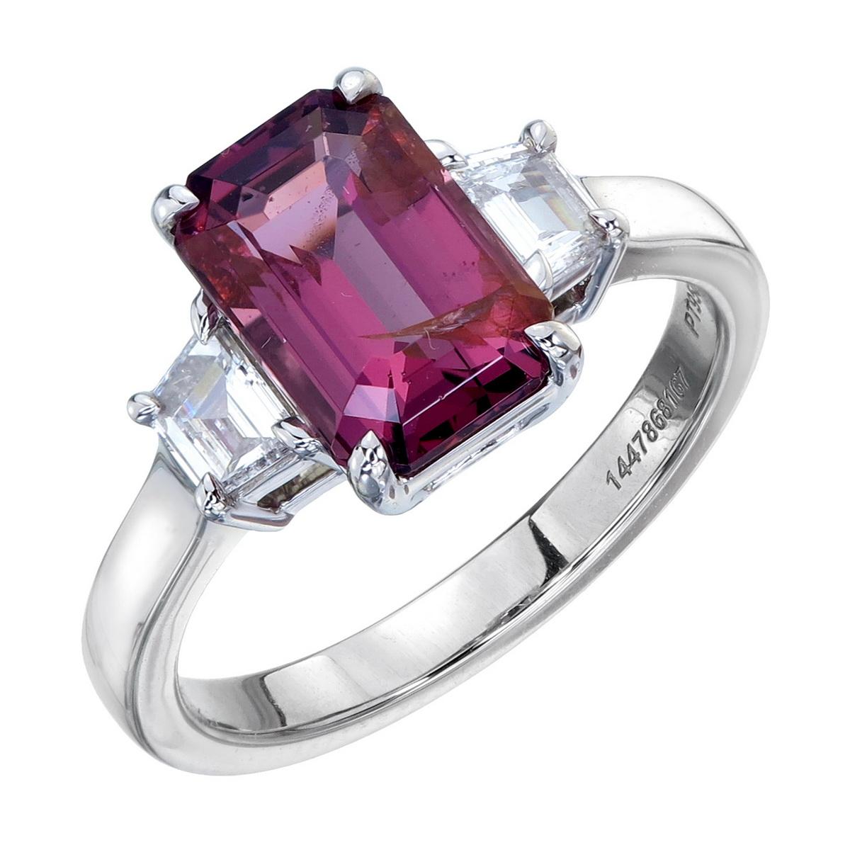 Orloff of Denmark's own; 'Amaranth Treasure'
This wonderful three-stone ring features a 2.52 carat purplish pink spinel along with two VVS2, F-Colored trapezoid diamonds on each side.
The glistening white shine of the diamonds bring a robust