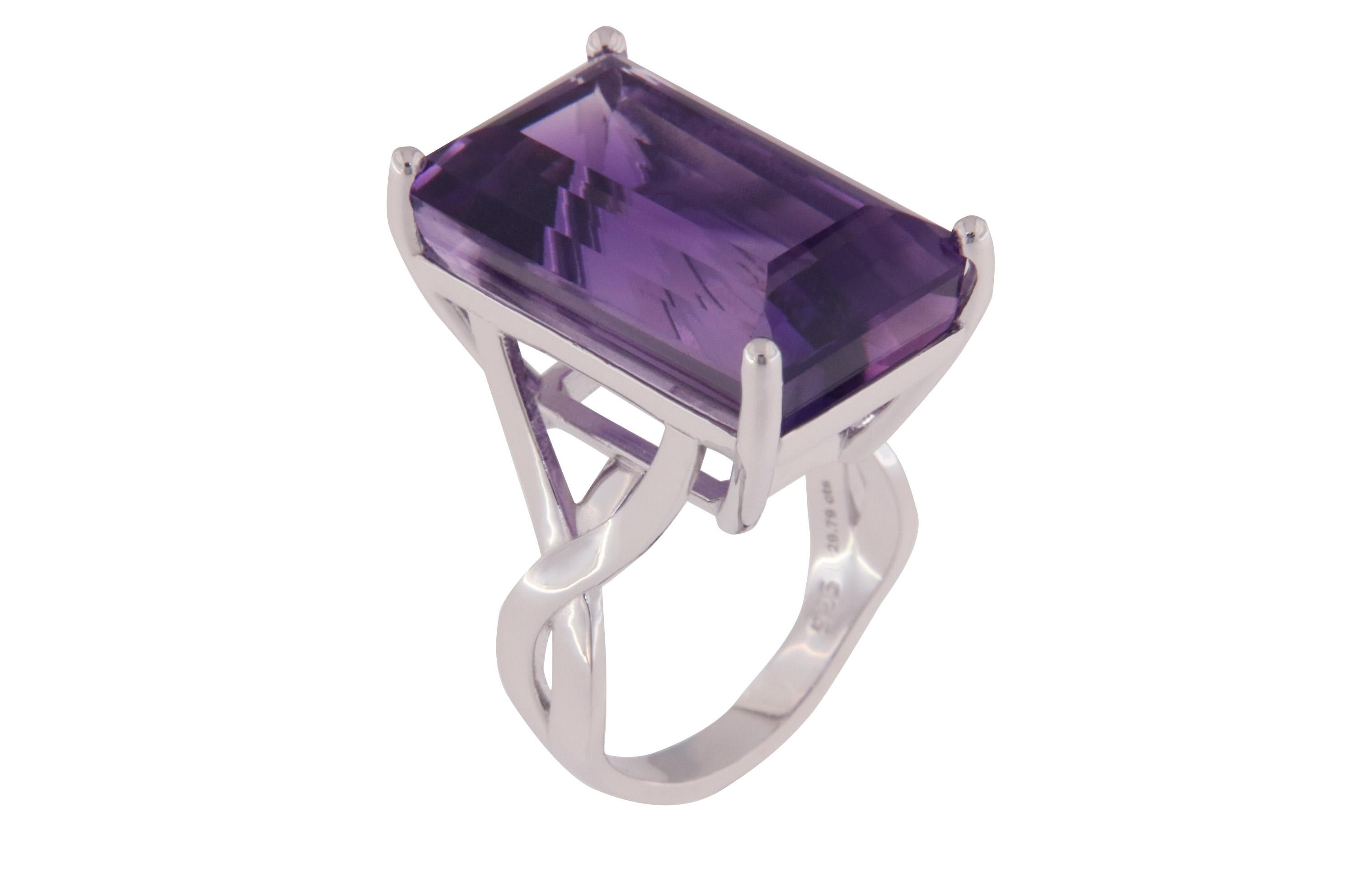 Orloff of Denmark; Amethyst Ring Fashioned out of 925 Sterling Silver.

Presenting a gorgeous amethyst ring, set in polished 925 sterling silver. The centerpiece is a beautifully faceted amethyst with a deep purple color that sparkles in the light.